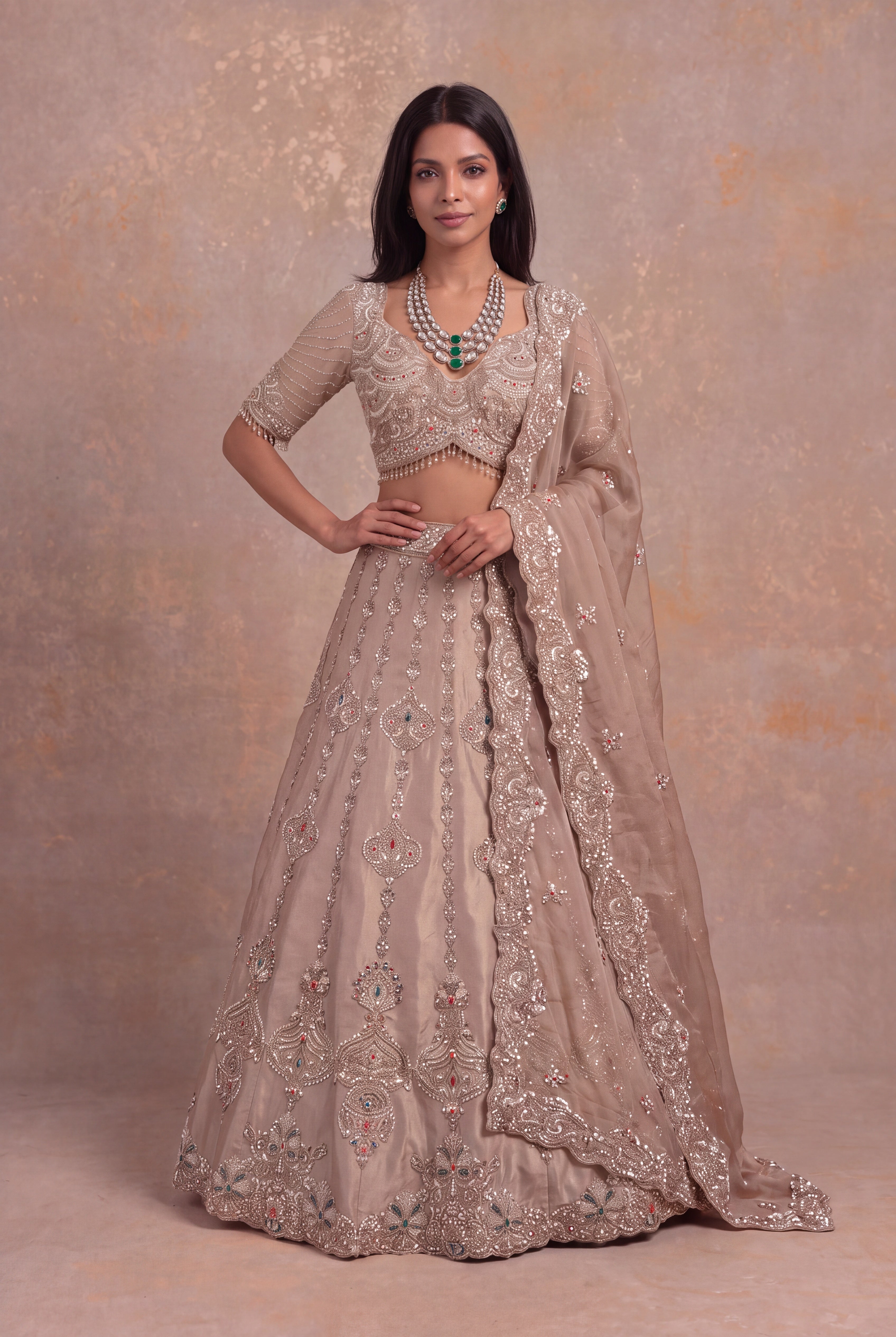 Golden Tissue Lehenga with Multicolour Kundan & Sequin Embroidery