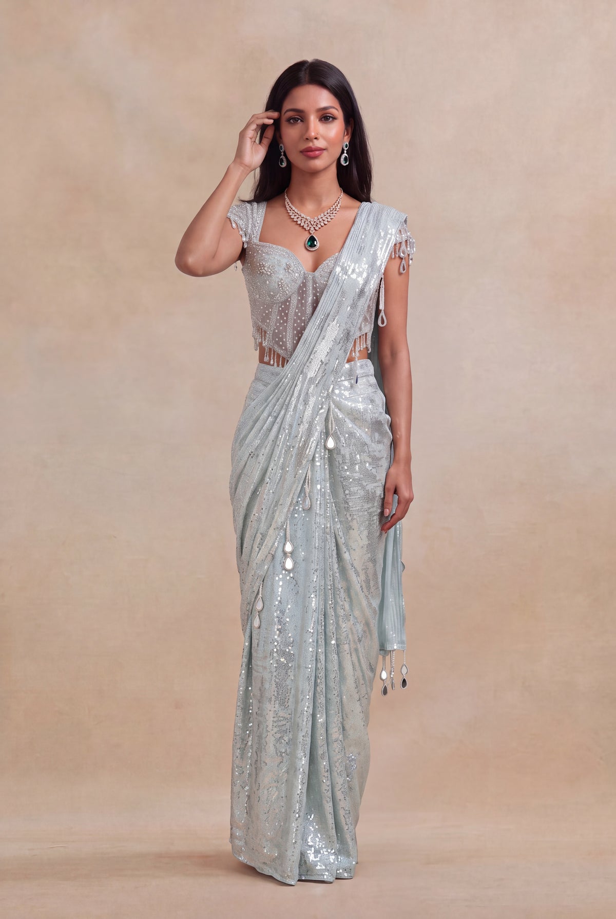 Ice Blue Net Drape Saree with Embellished Corset Blouse