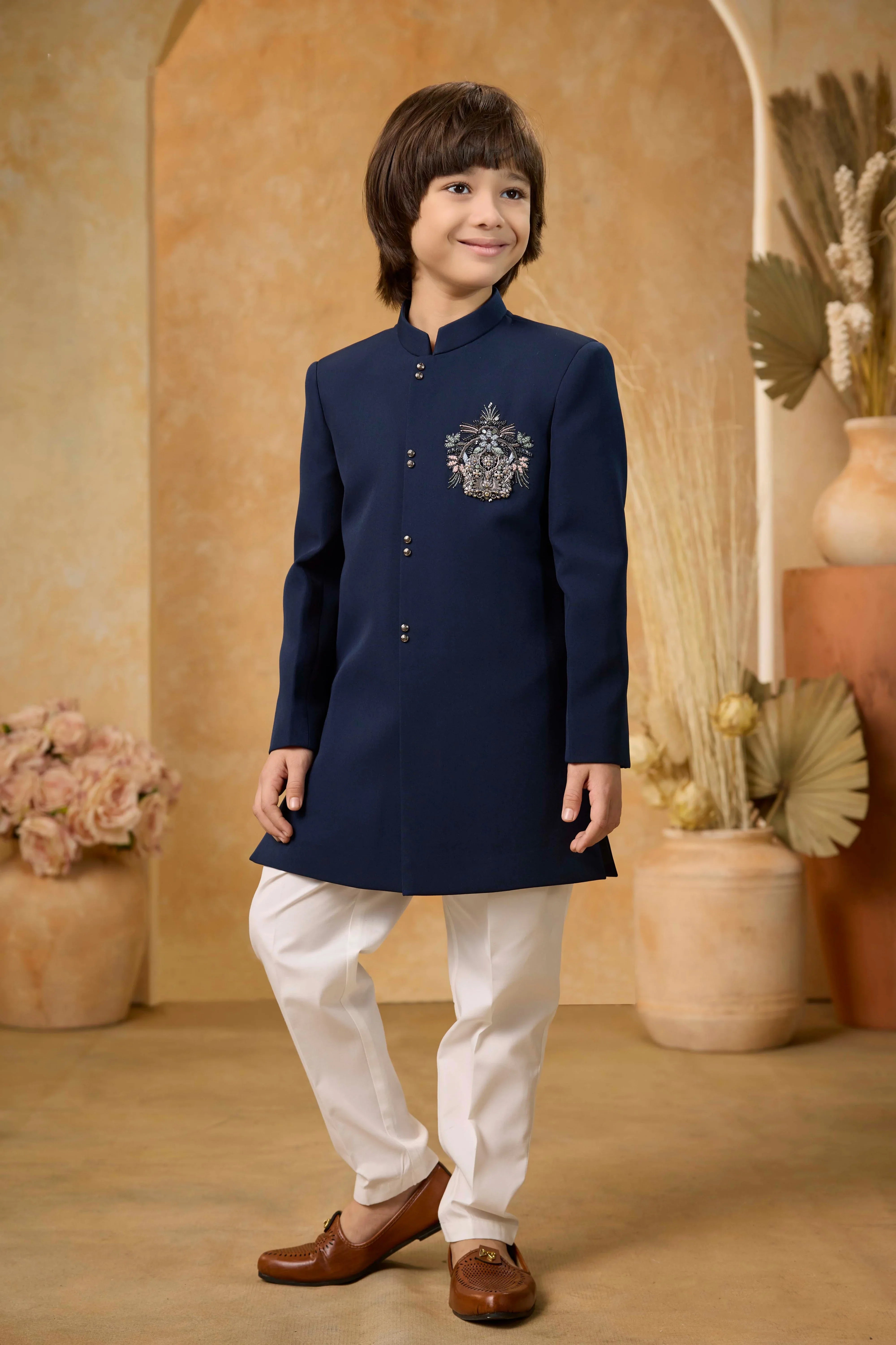 Boys Navy Blue Jodhpuri Suit with Embroidered Crest | Mokshaa