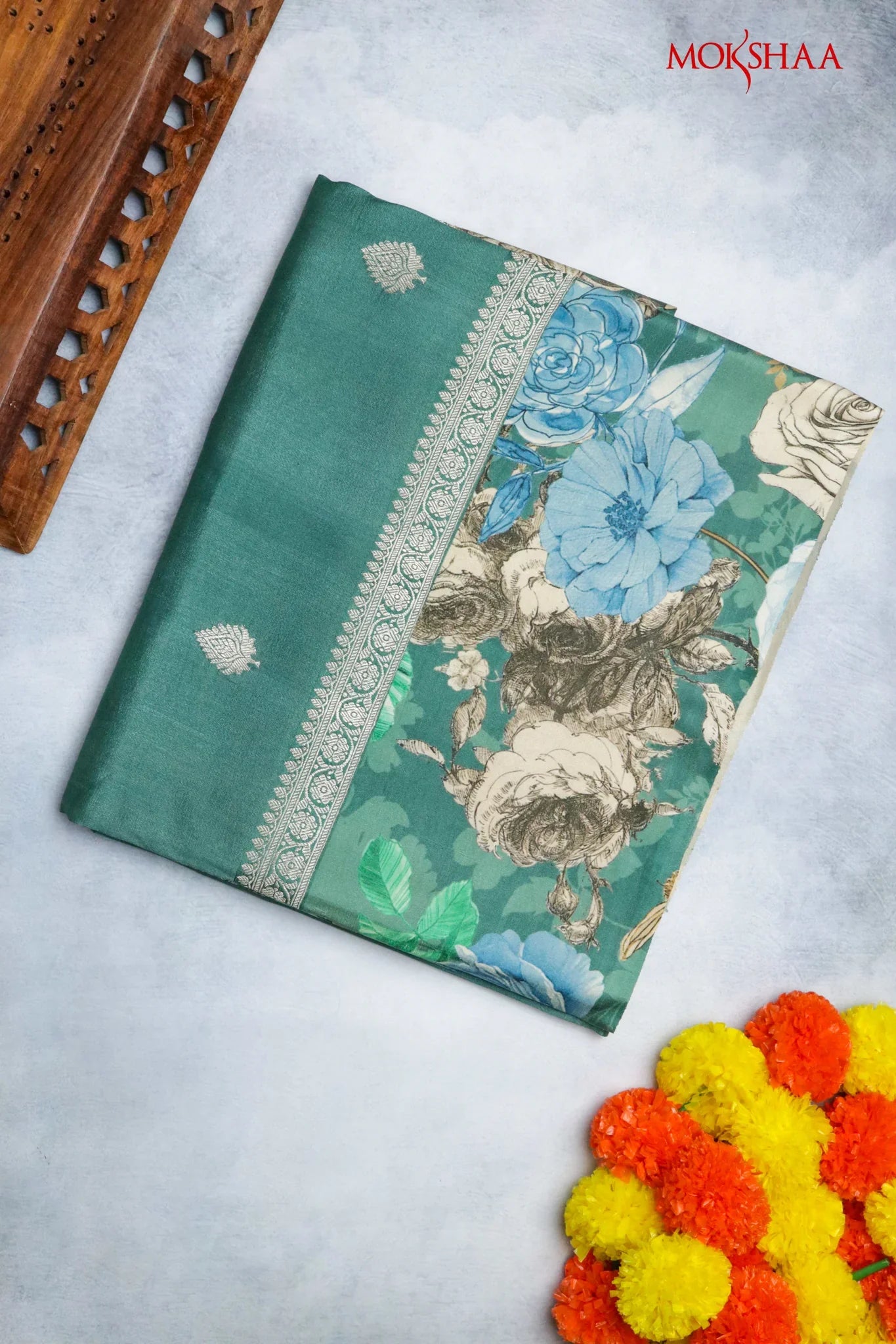 Turf Green Tussar Silk Saree with Silver Zari Motifs & Printed Border | Mokshaa