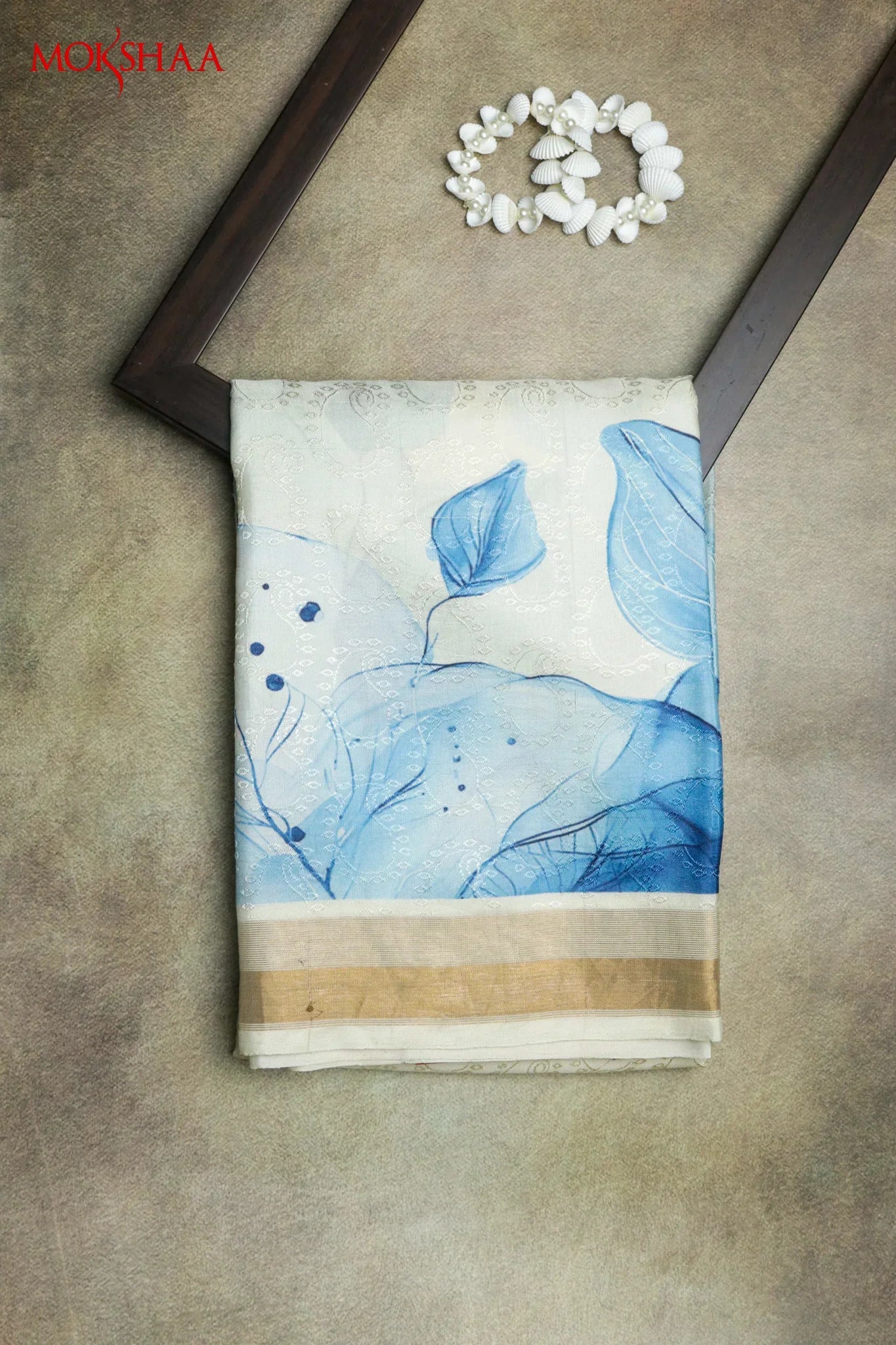 Off White Silk Saree with Blue Leaf Print Border | Mokshaa