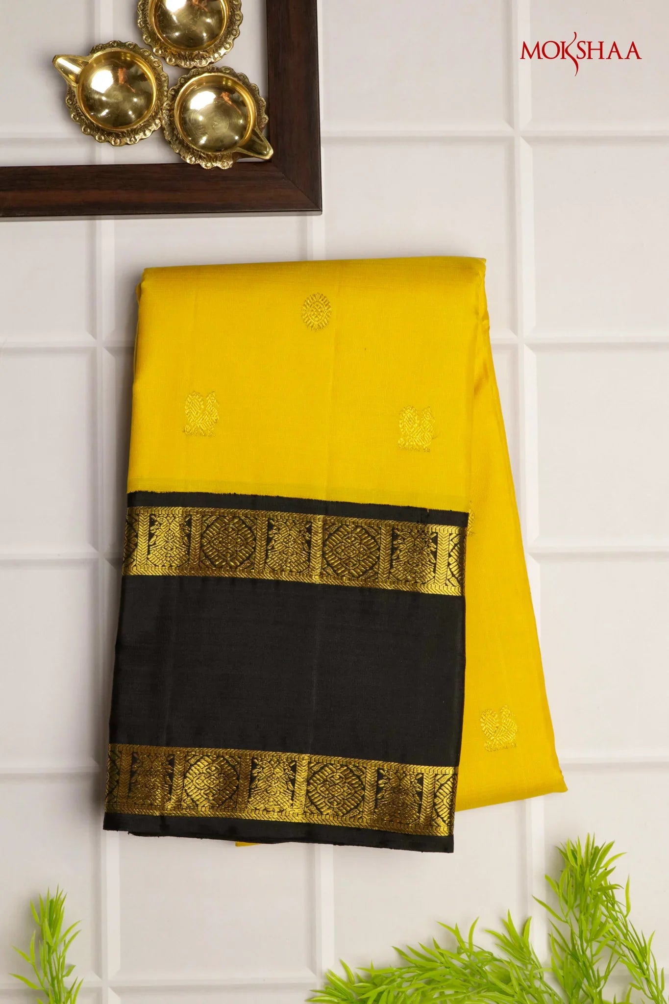 Yellow Kanchivaram Silk Saree with Black Retapet Border | Mokshaa
