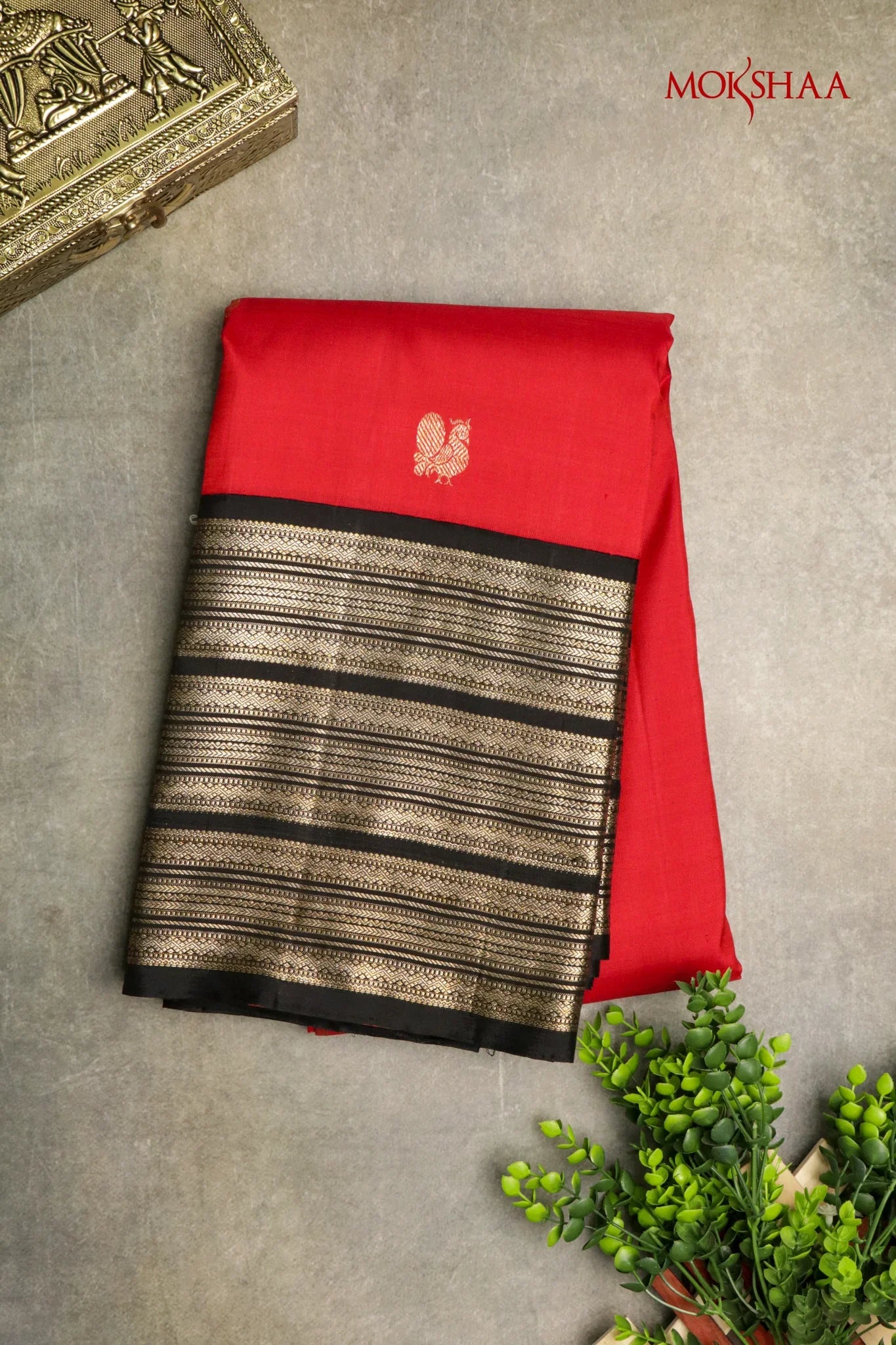 Red Kanchivaram Silk Saree with Golden Buttas and Black Zari Border - Mokshaa
