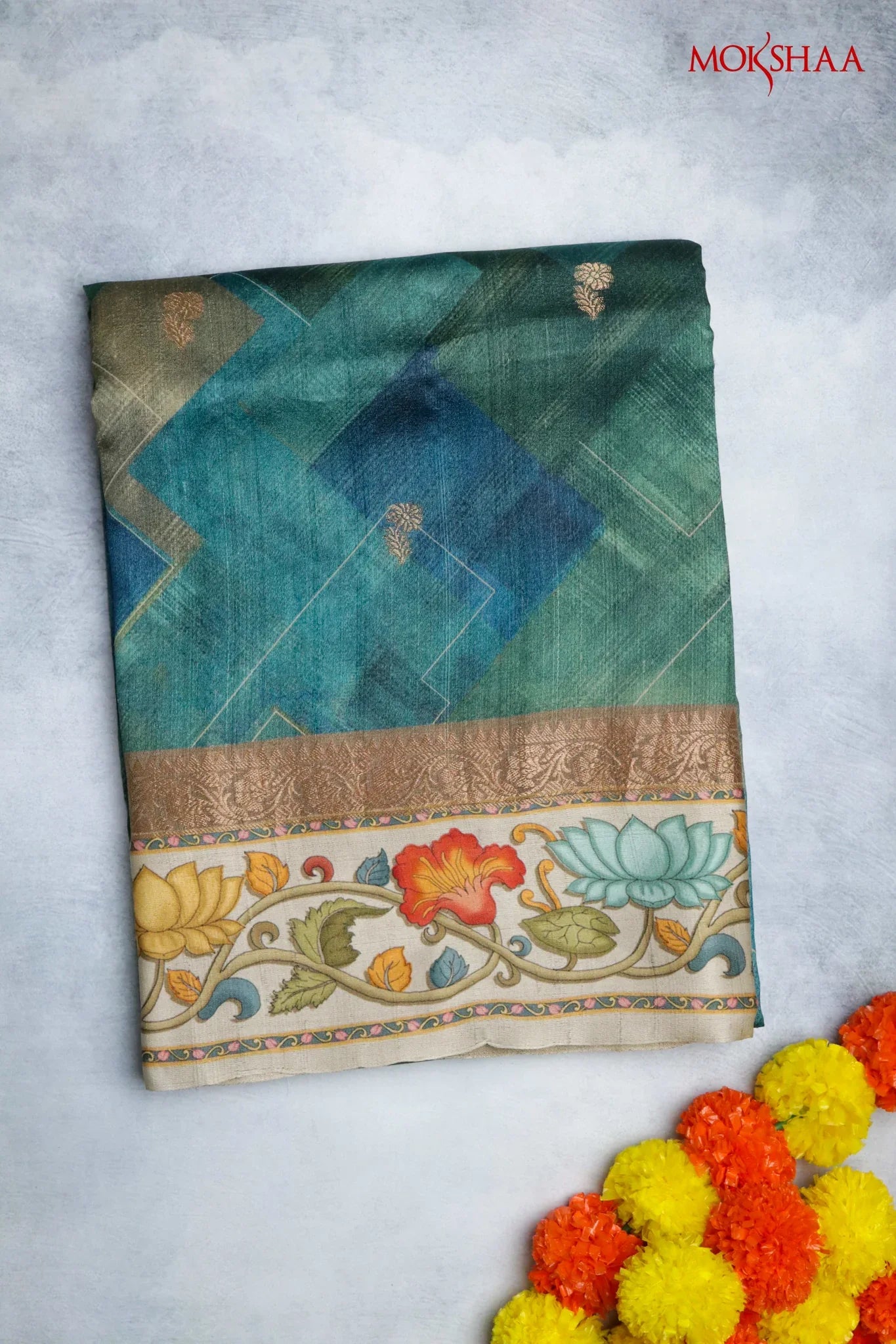 Blue-Green Tussar Silk Saree with Zari Motifs & Printed Border | Mokshaa
