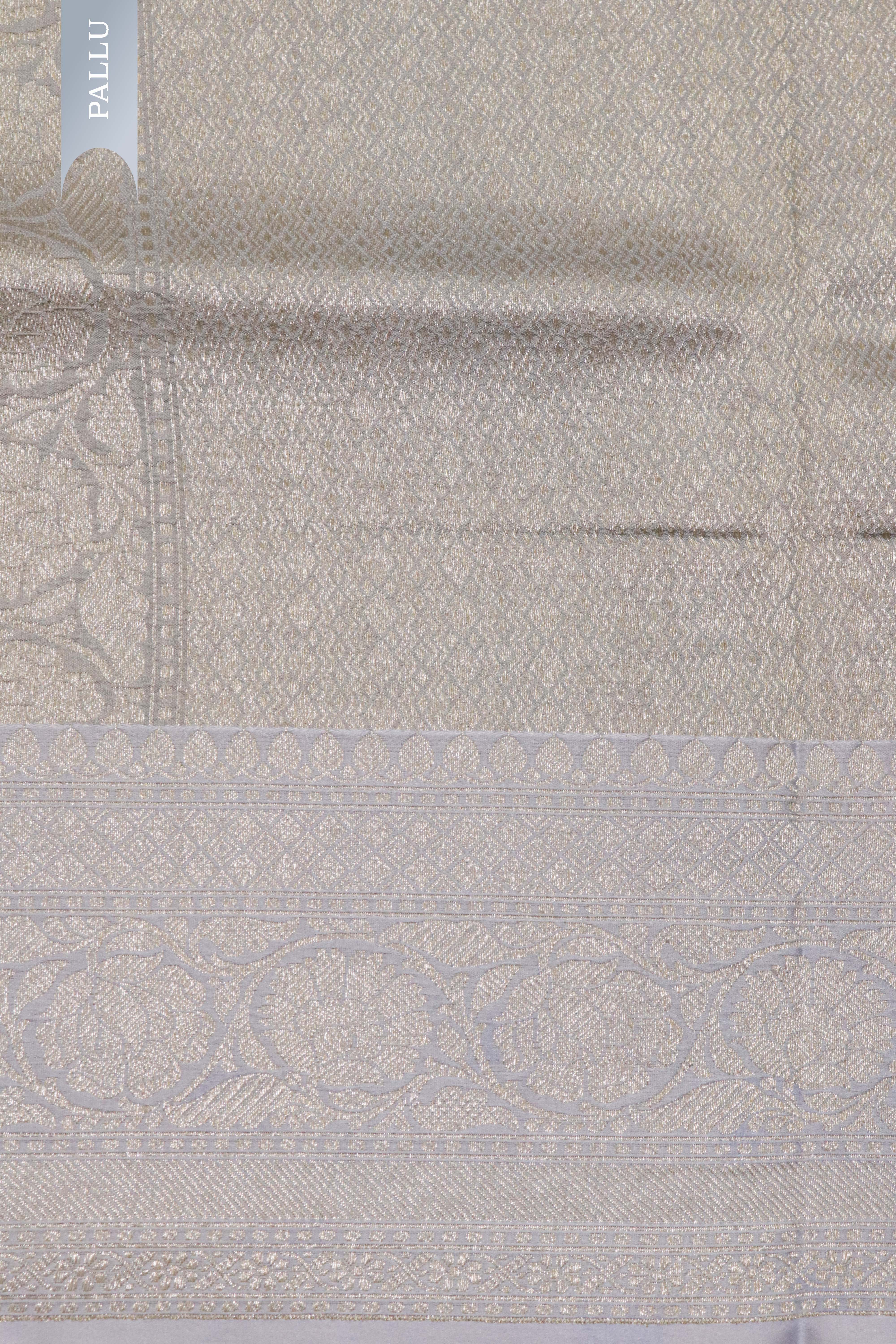 Powder Blue Tussar Silk Saree with Floral Print & Zari Border