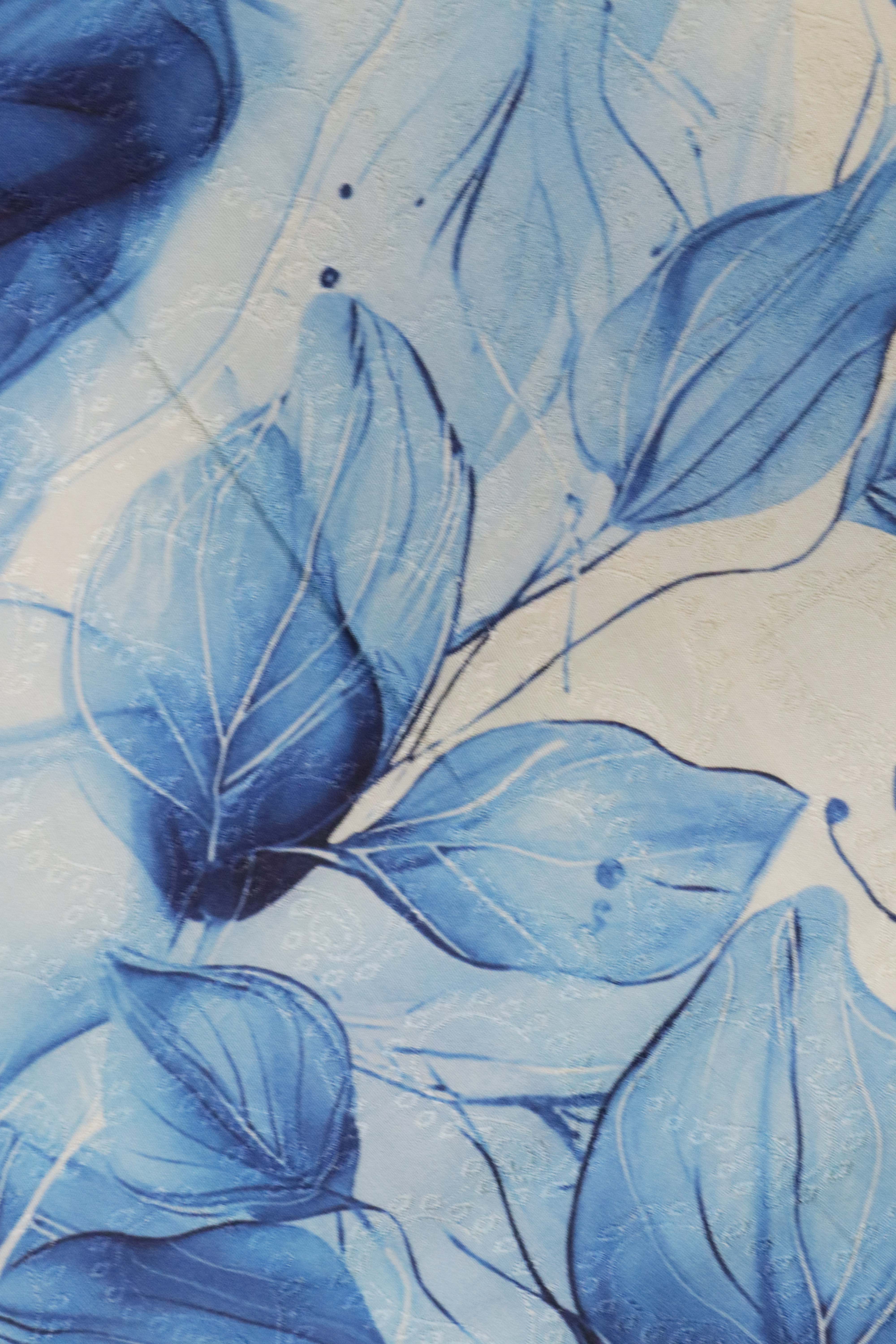 Off White Silk Saree with Blue Leaf Print Border