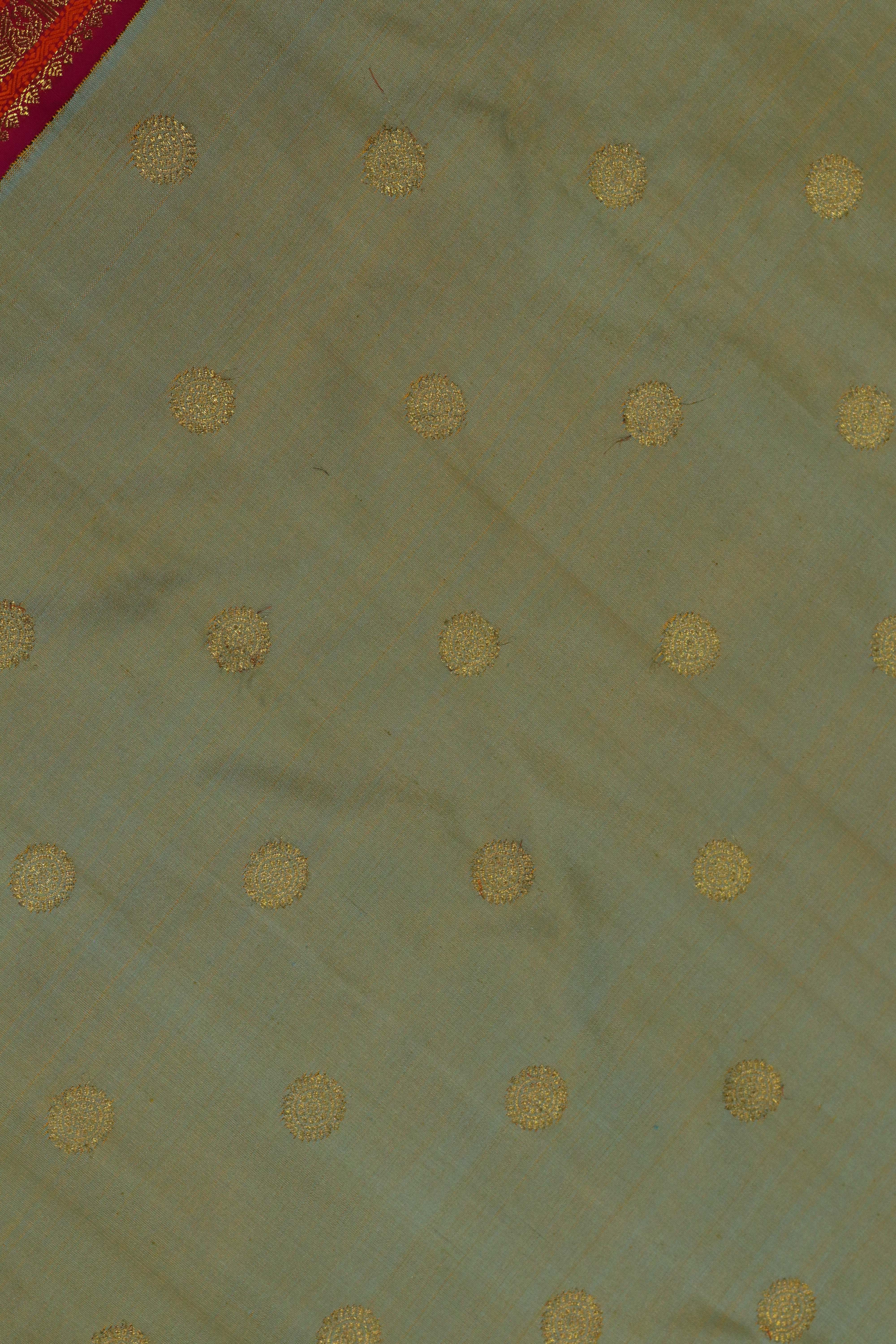 Pista Green Kanchivaram Silk Saree with Butta & Contrast Zari Border