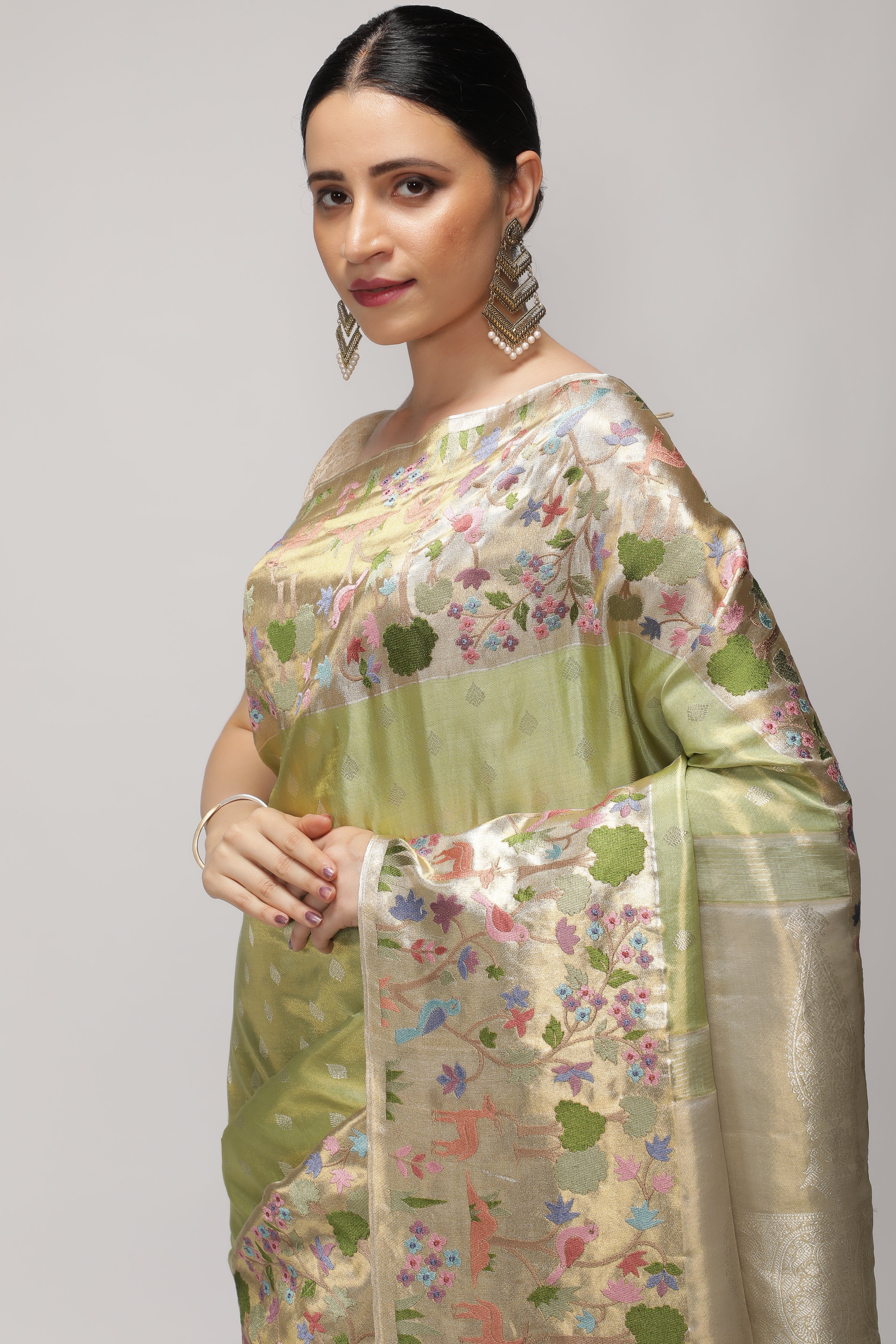 Green Kanchipuram Tissue Silk Saree with All-Over Zari Weaving and Contrast Embroidery Border