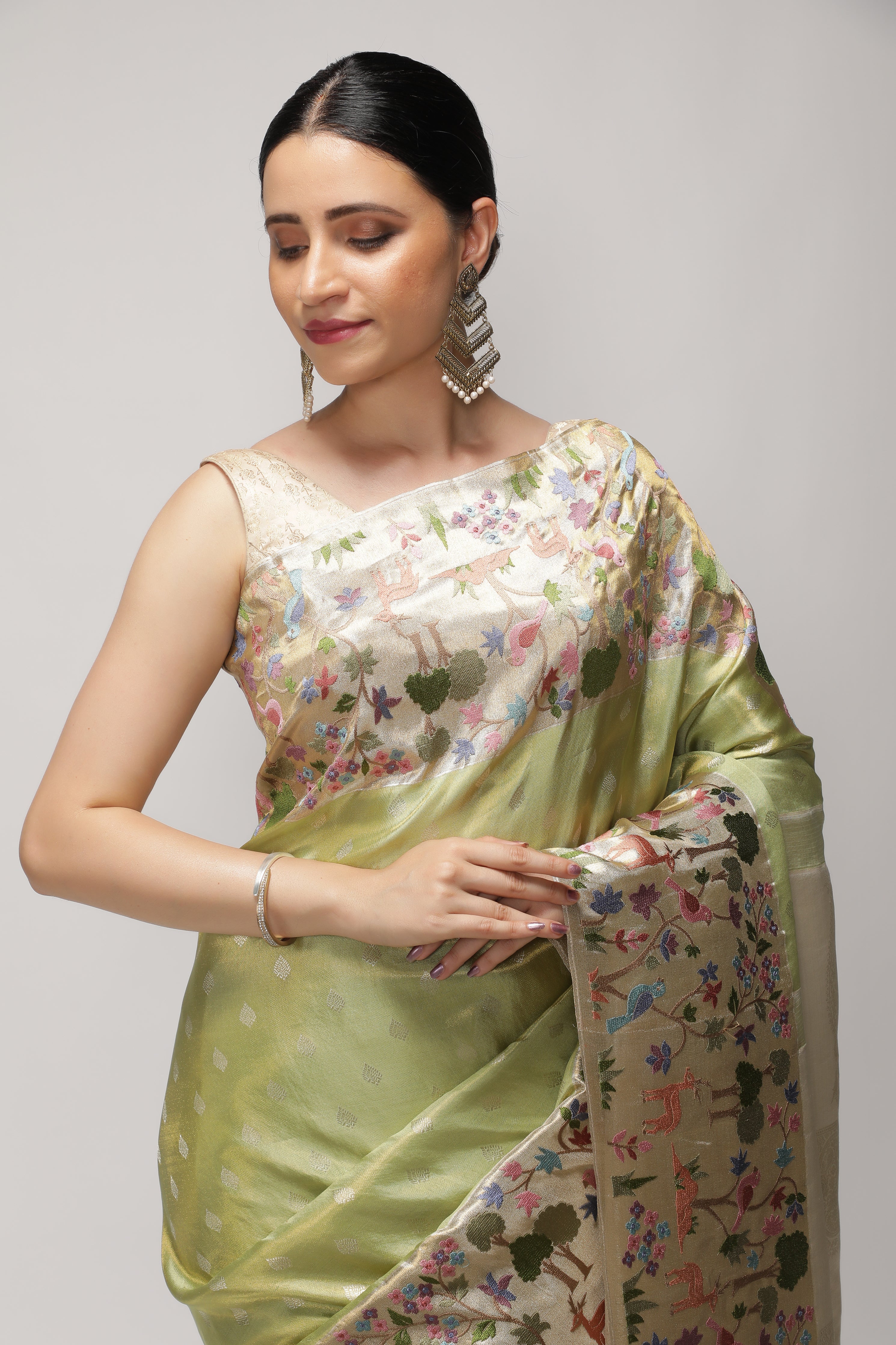 Green Kanchipuram Tissue Silk Saree with All-Over Zari Weaving and Contrast Embroidery Border
