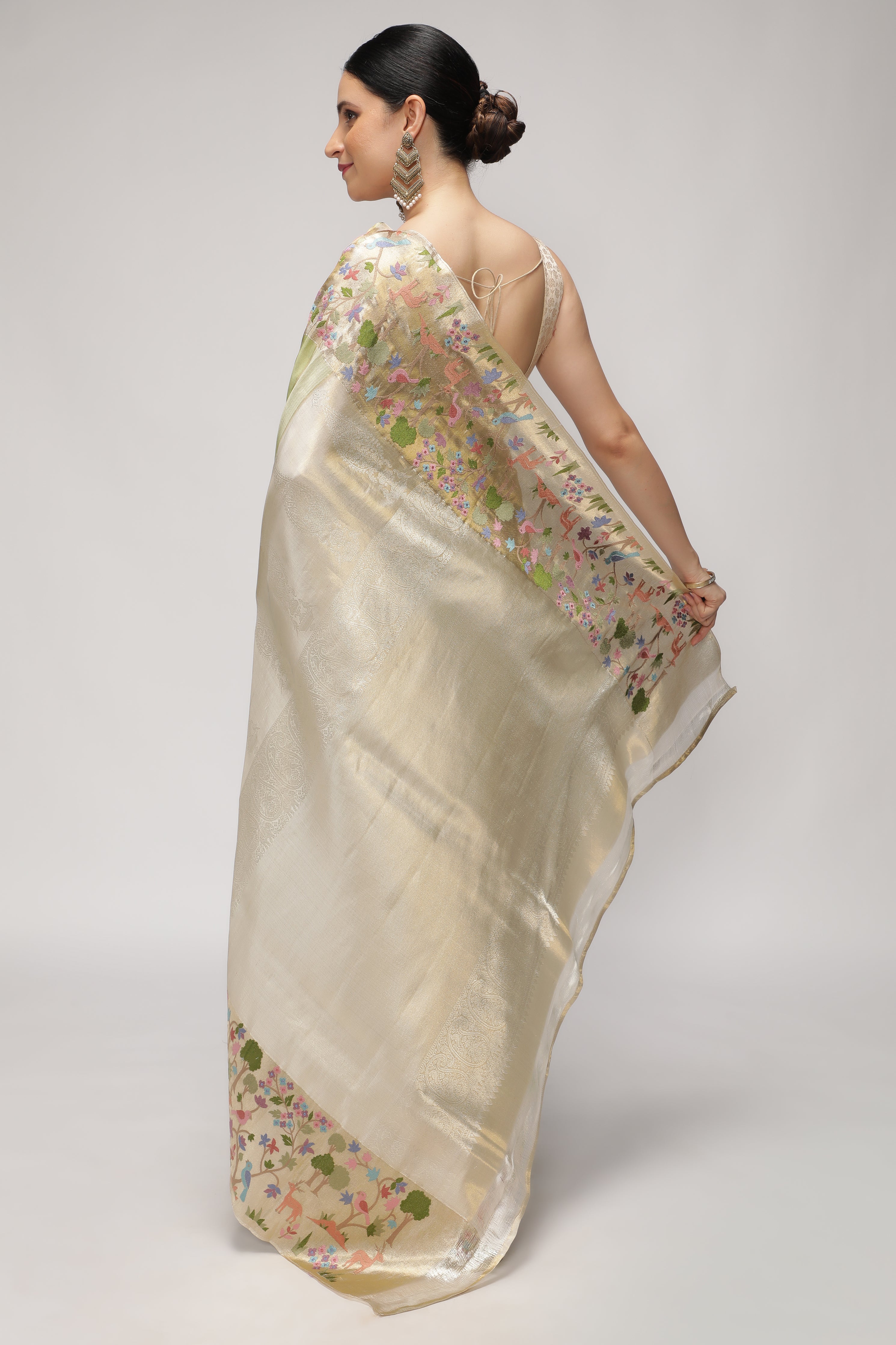 Green Kanchipuram Tissue Silk Saree with All-Over Zari Weaving and Contrast Embroidery Border