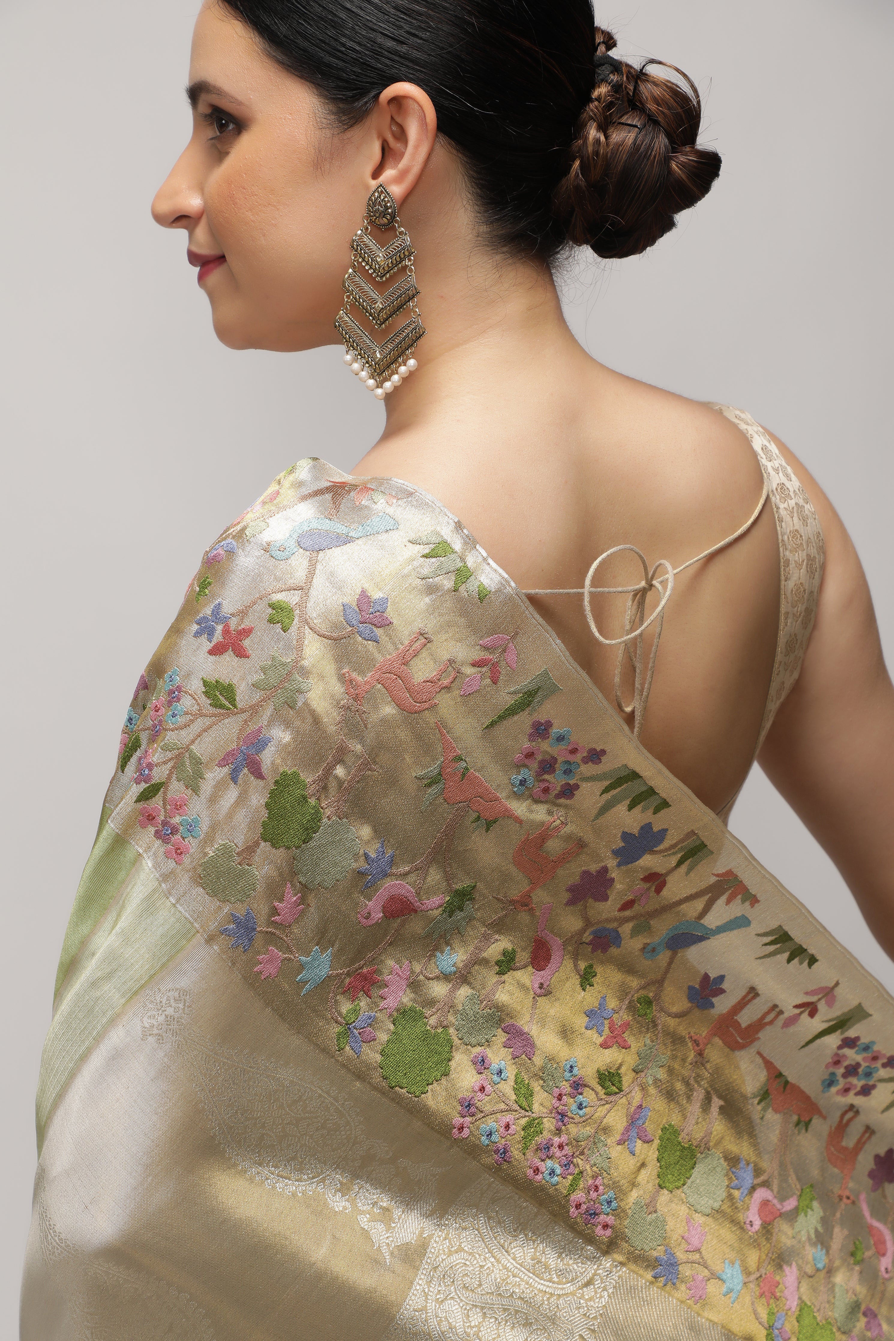 Green Kanchipuram Tissue Silk Saree with All-Over Zari Weaving and Contrast Embroidery Border