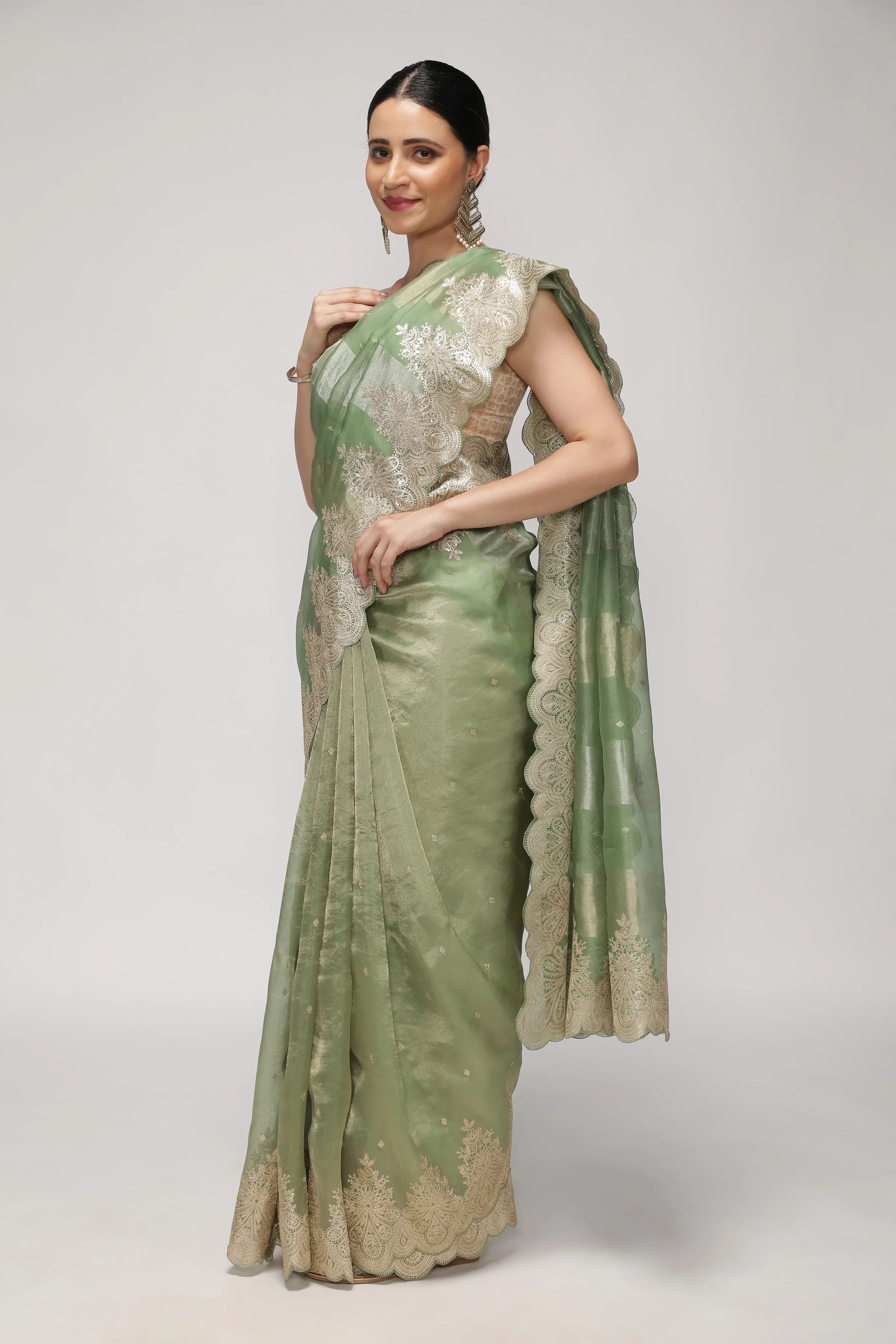 Mint Green Organza Saree with Zari Stripes, Sequins Highlight & Zari-Embroidered Border - Mokshaa