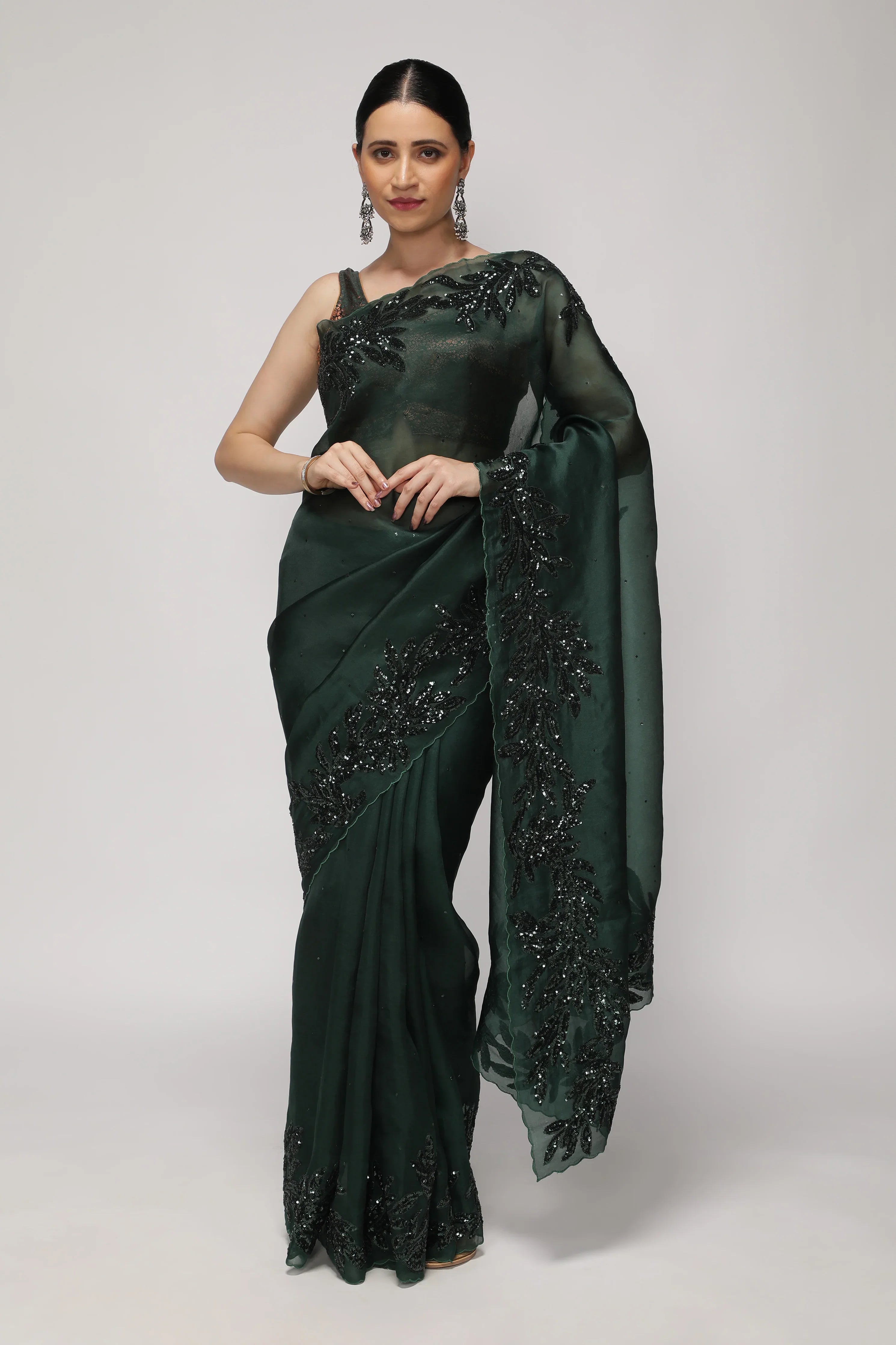 Bottle Green Organza Saree with Self Sequins & Floral Highlight Border | Mokshaa