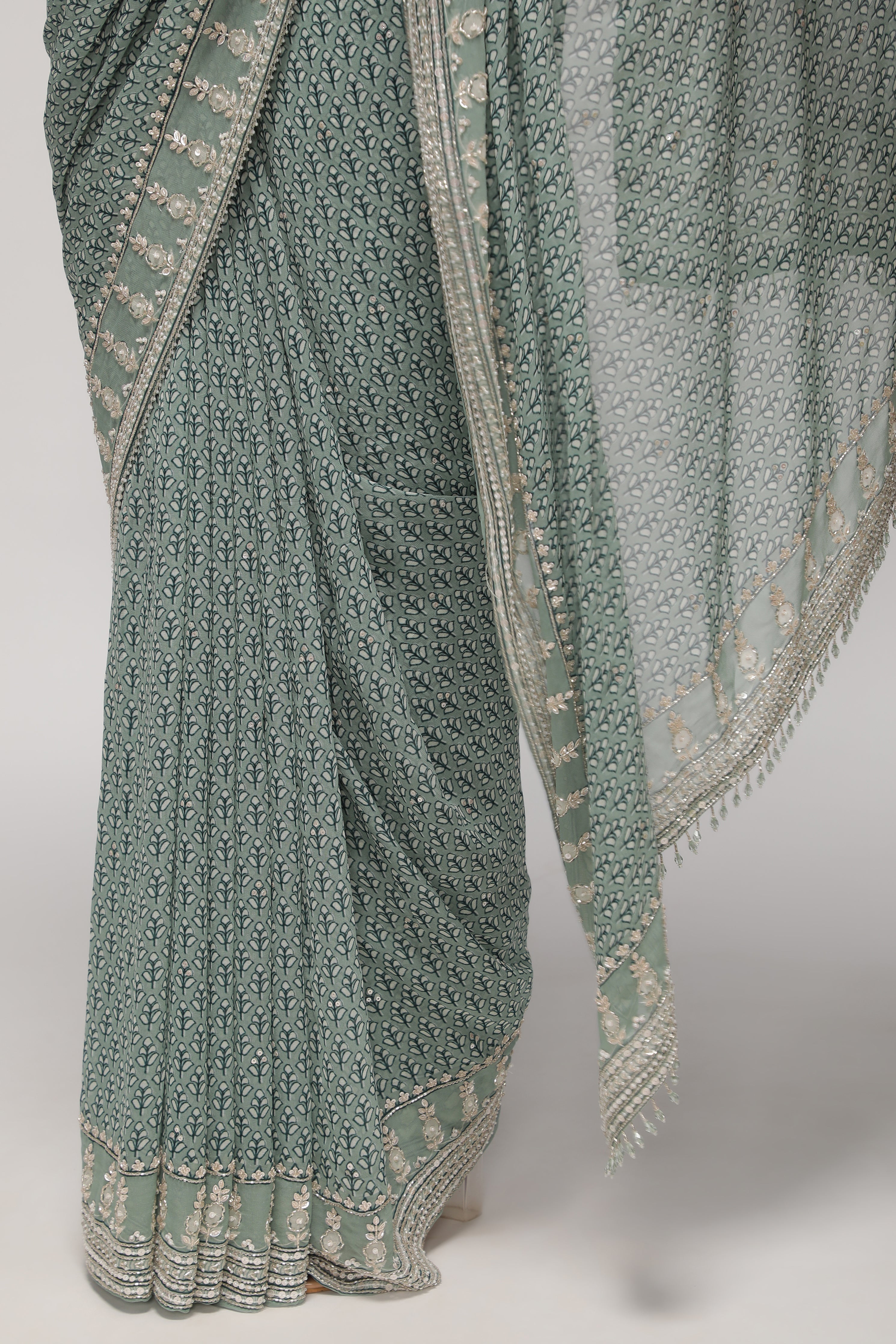 Mint Blue Georgette Saree with Printed Sequins Highlight Body and Sequins Border