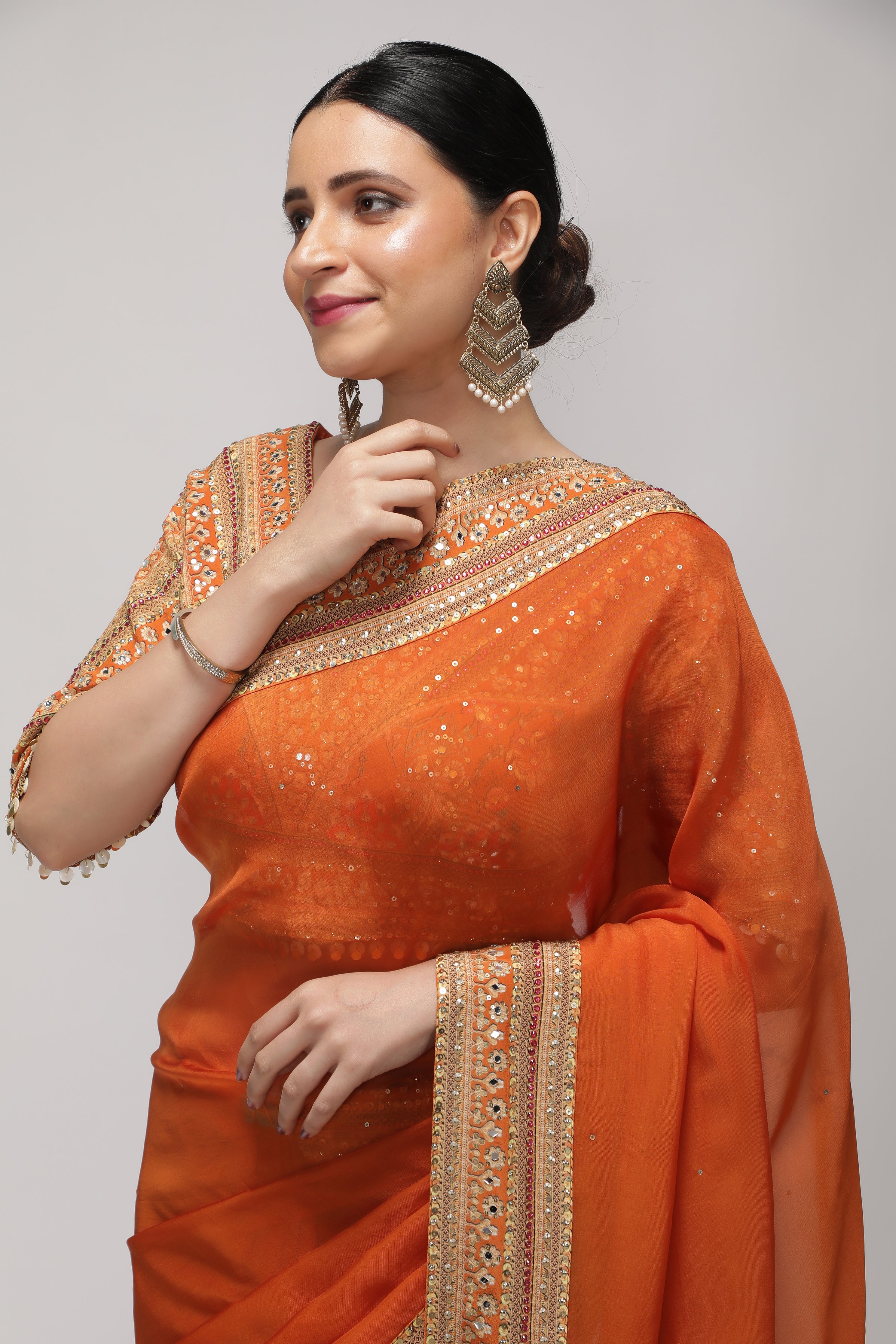 Orange Silk Organza Saree with Sequin Highlights & Mirror Work Border