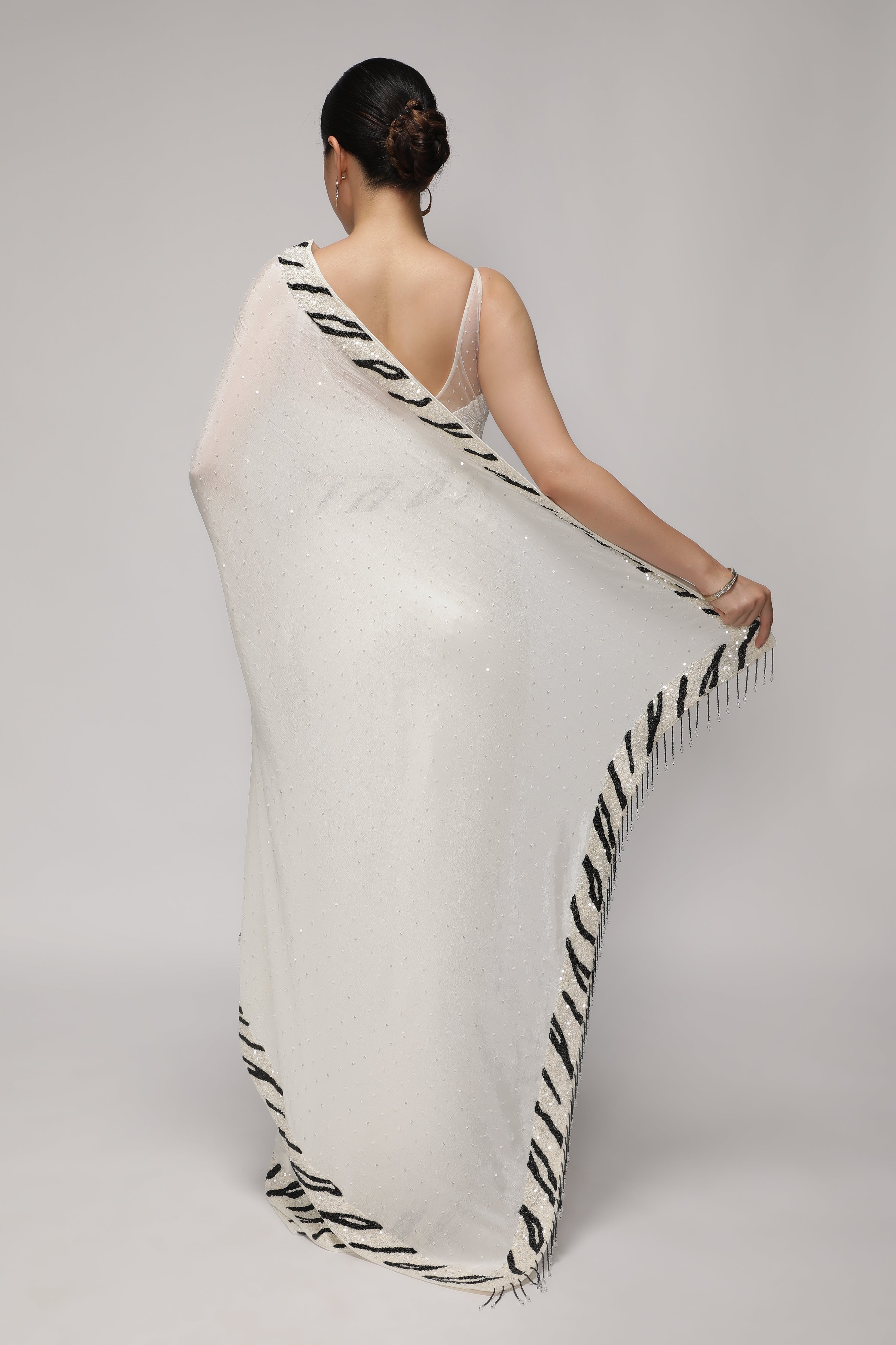 White Crepe Chiffon Saree with Sequins and Beaded Border