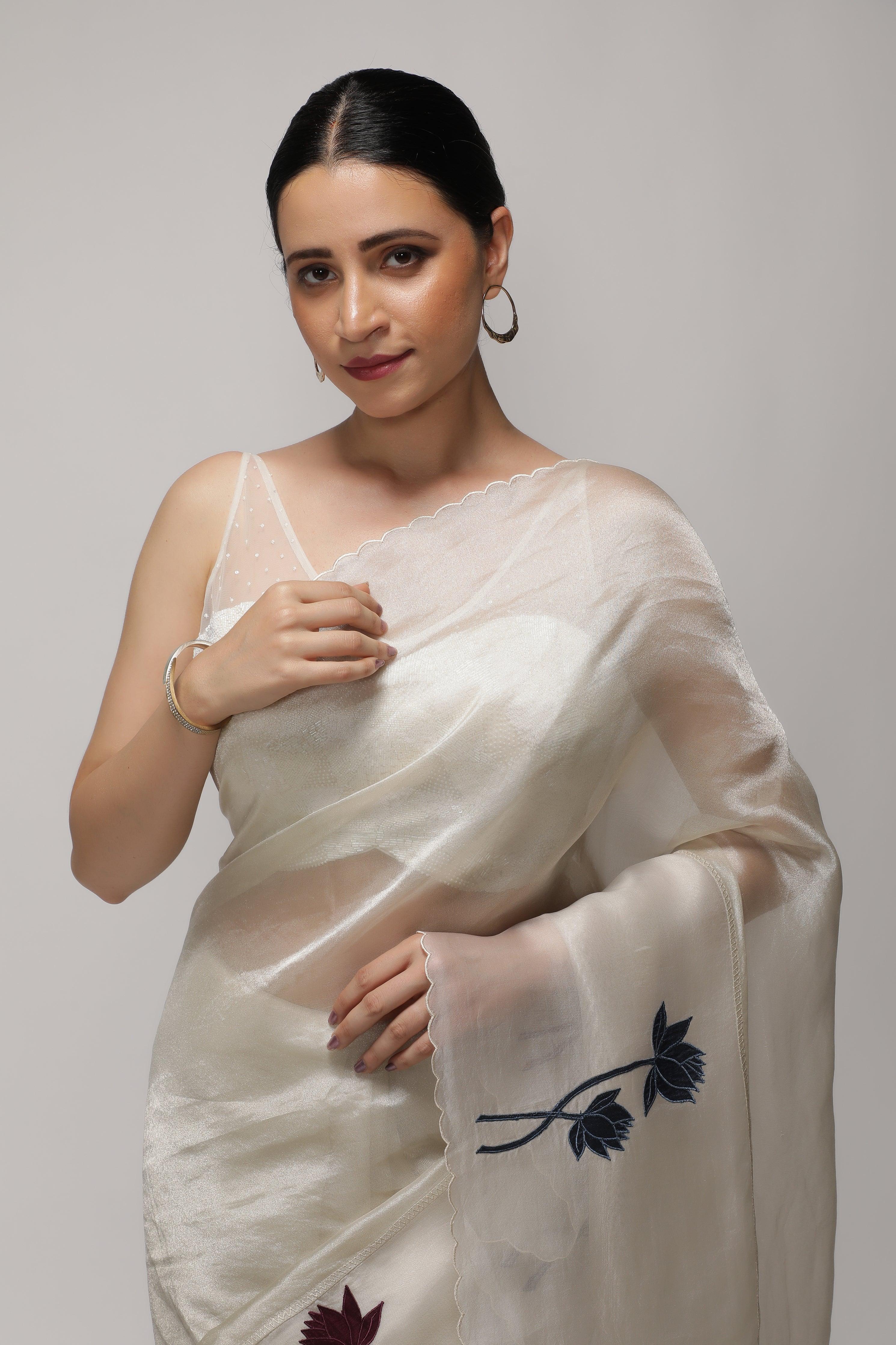 Silver White Tissue Saree with Multicolor Floral Appliqu鑼�Kora Border - Mokshaa