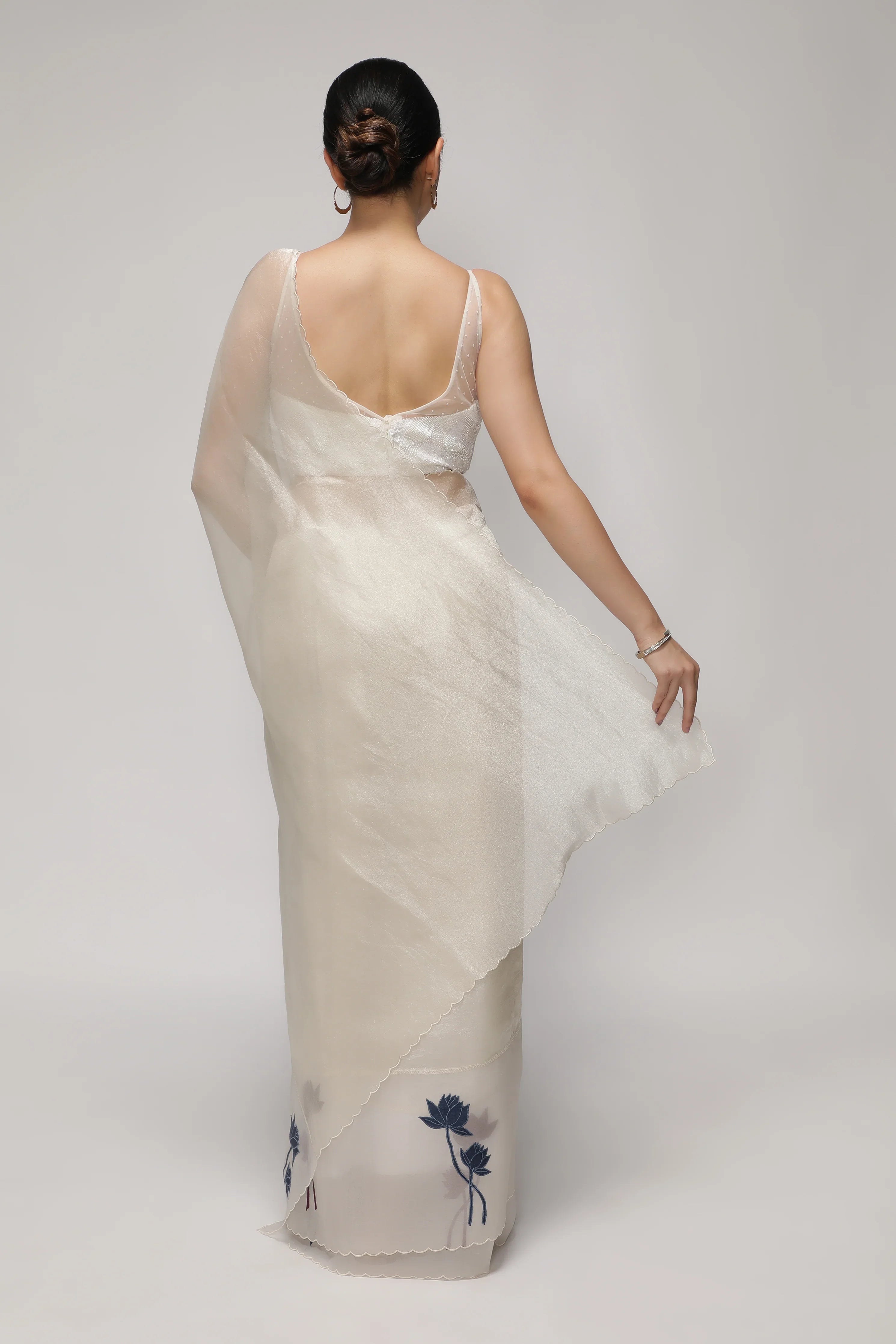 Silver White Tissue Saree with Multicolor Floral Appliqu鑼�Kora Border - Mokshaa