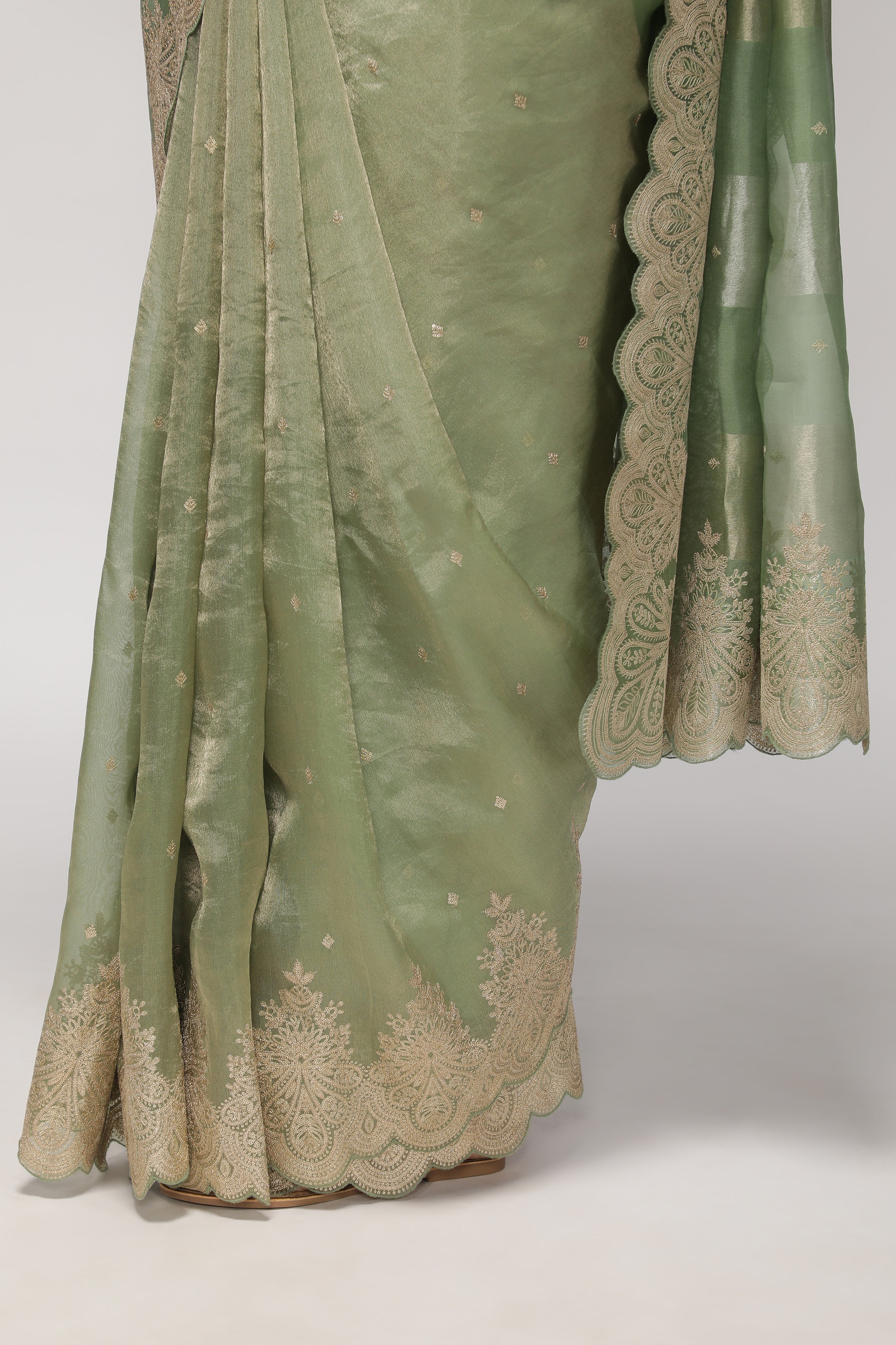 Mint Green Organza Saree with Zari Stripes, Sequins Highlight & Zari-Embroidered Border