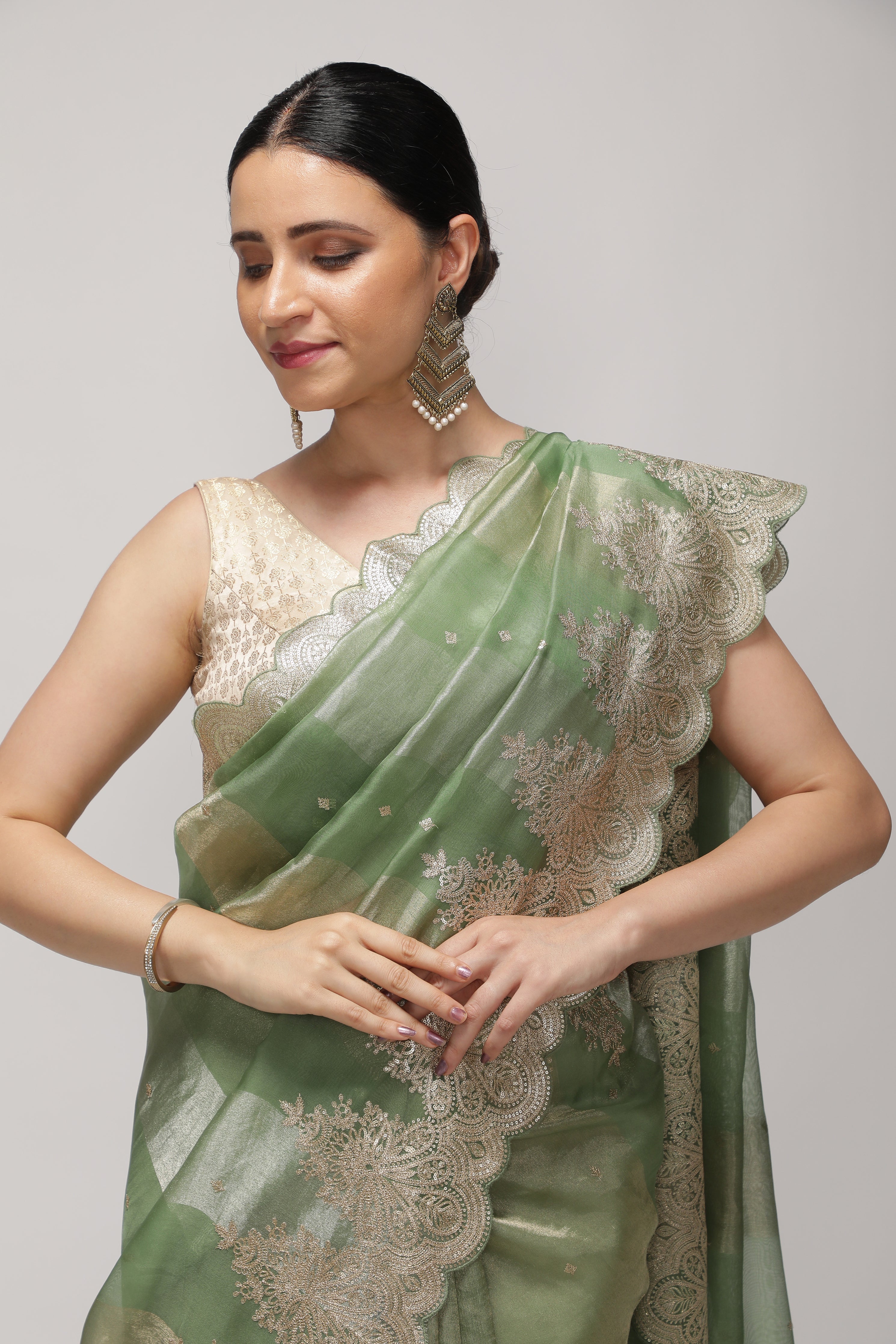 Mint Green Organza Saree with Zari Stripes, Sequins Highlight & Zari-Embroidered Border