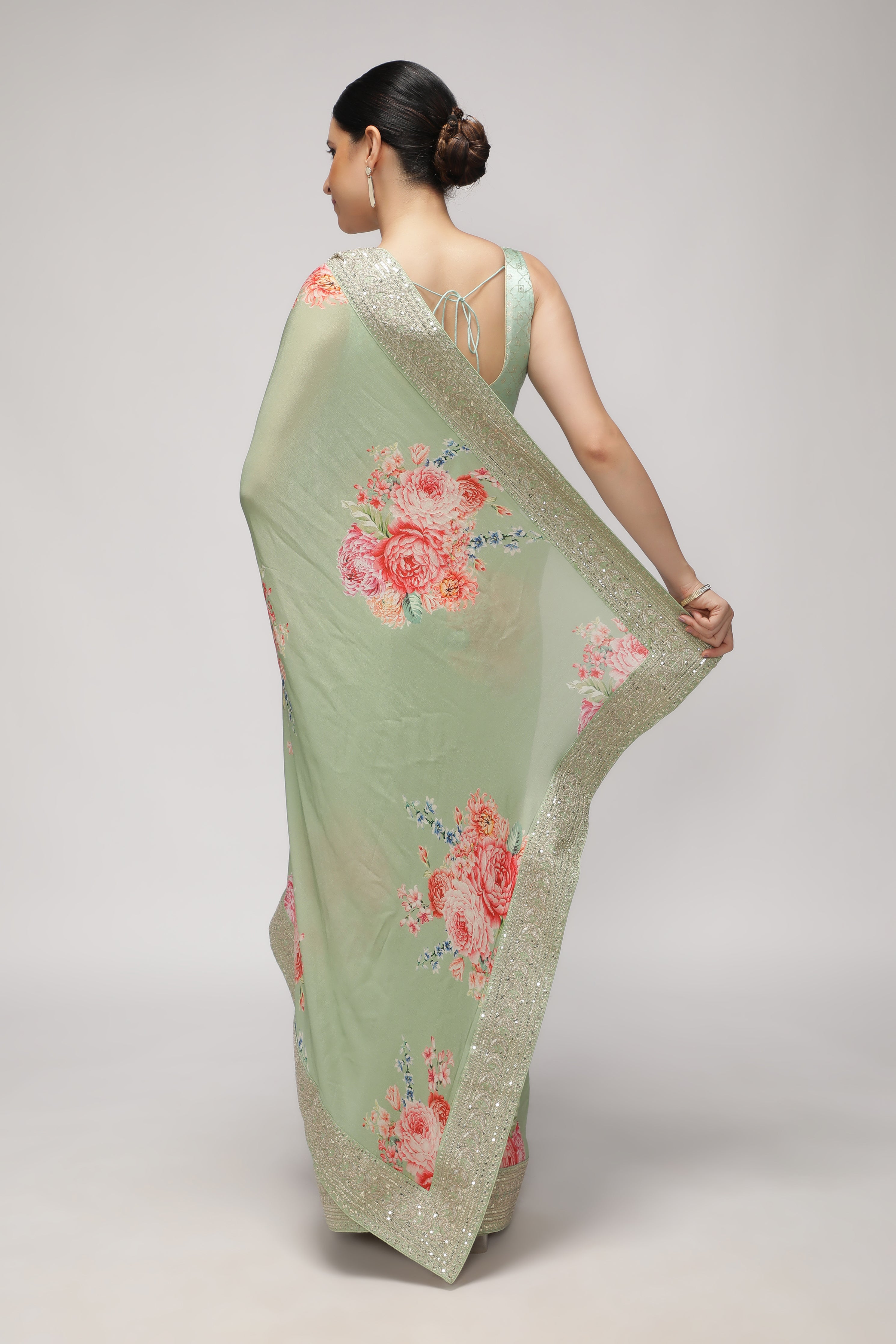 Green Crepe Georgette Saree with Floral Print & Aari Work Border