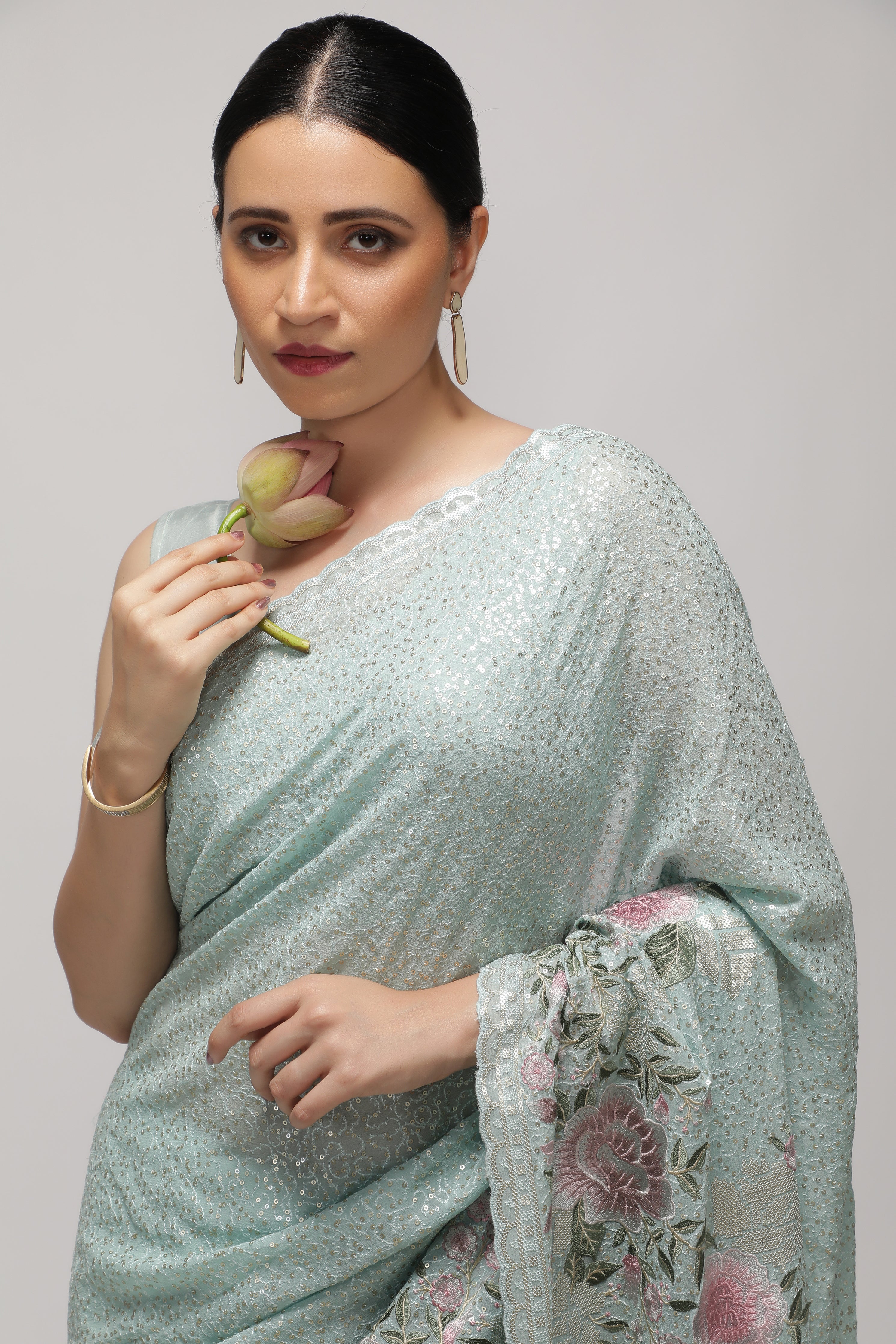 Sea Blue Georgette Saree with All-Over Sequins Body & Embroidered Border