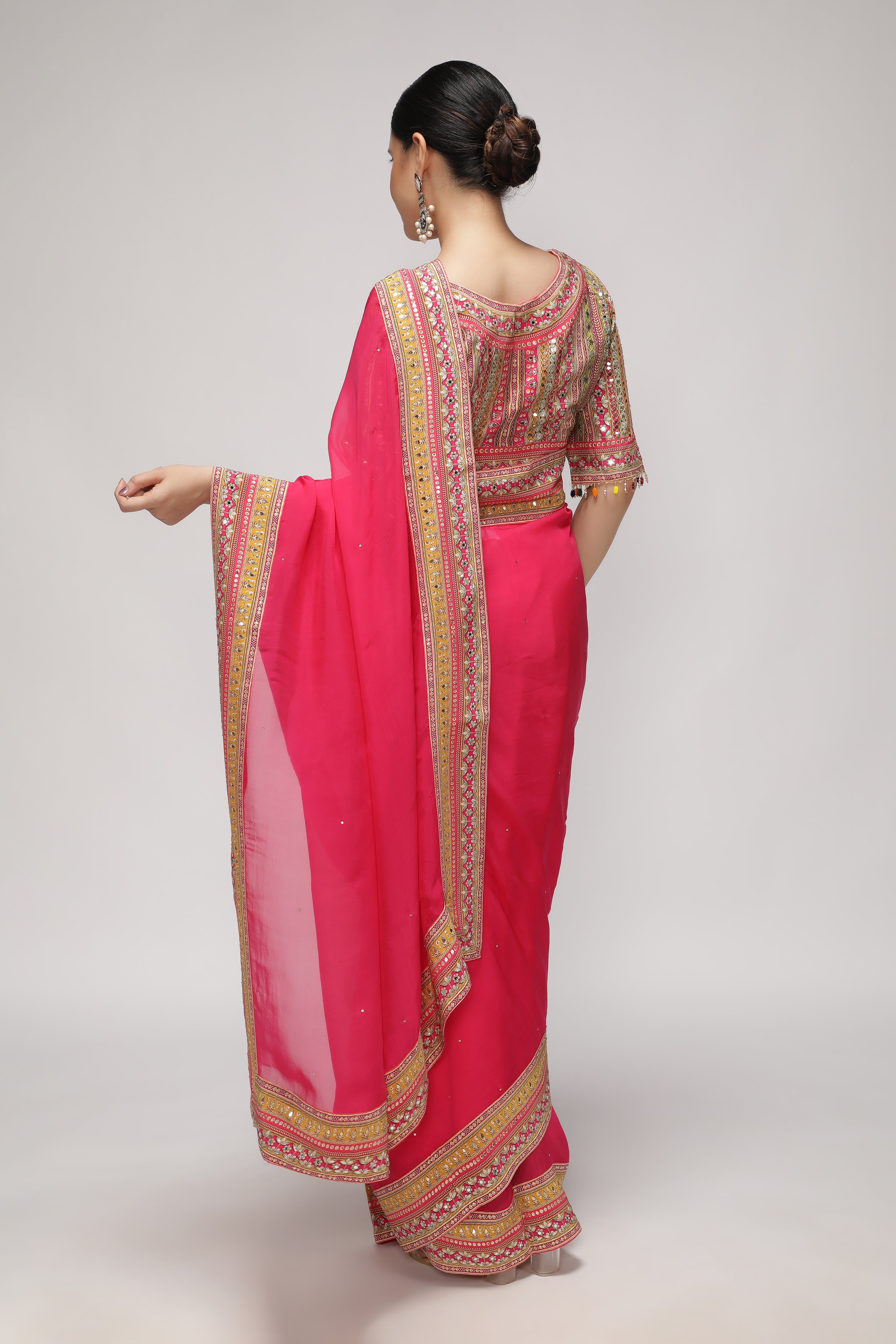 Rani Pink Silk Organza Saree with Sequin Highlights & Mirror Work Border