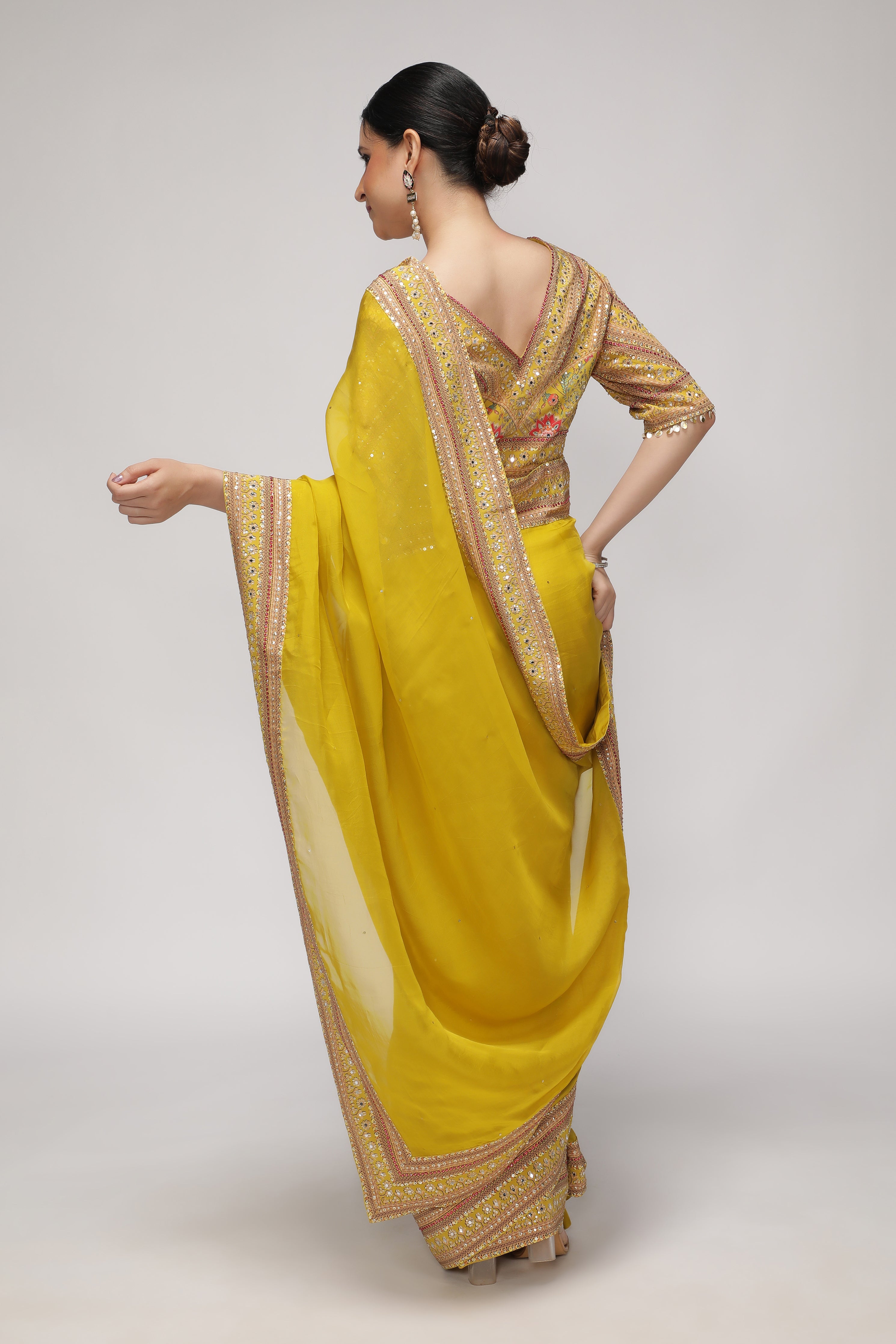 Yellow Silk Organza Saree with Sequin Highlights & Mirror Work Border