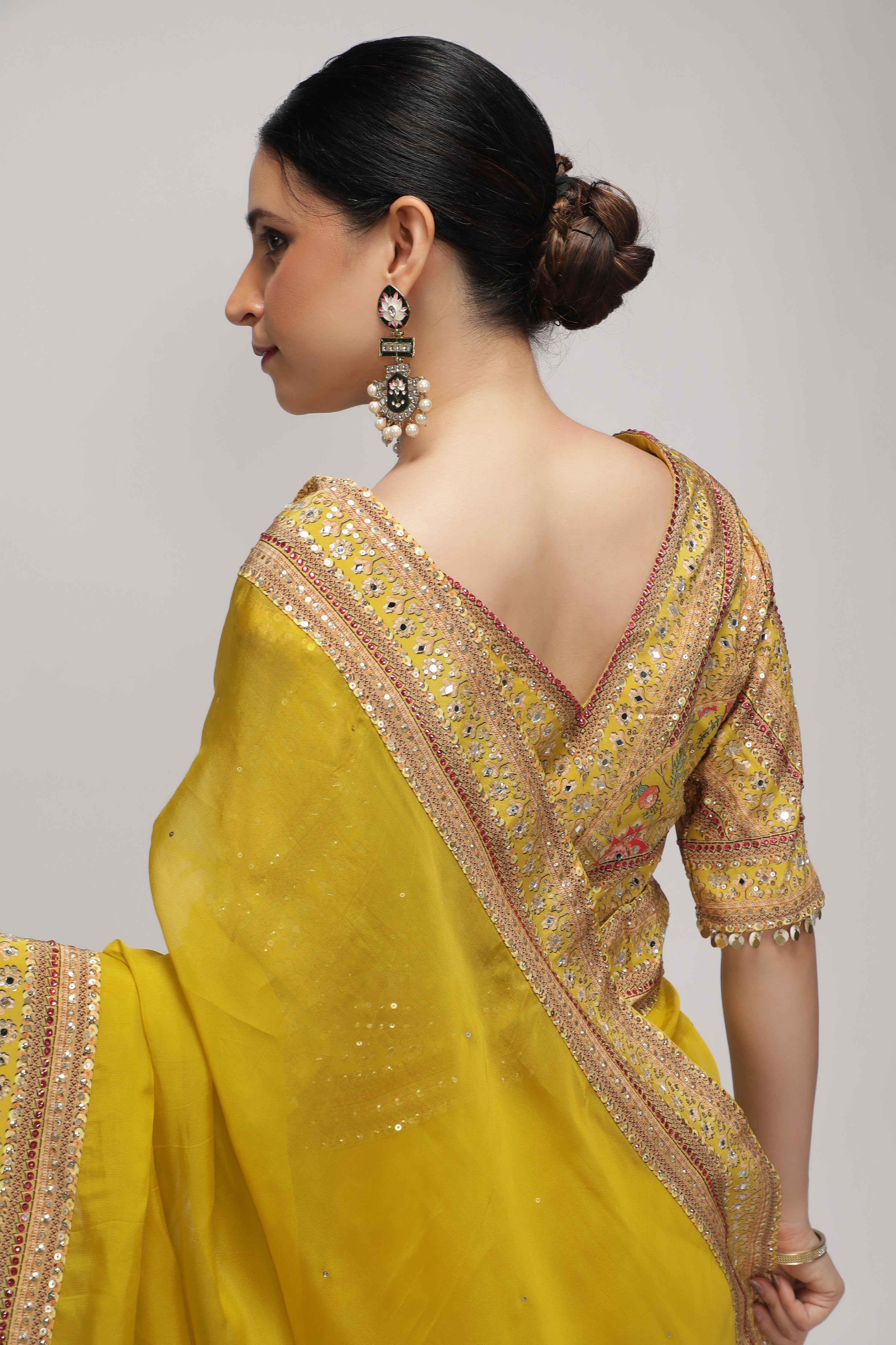 Yellow Silk Organza Saree with Sequin Highlights & Mirror Work Border
