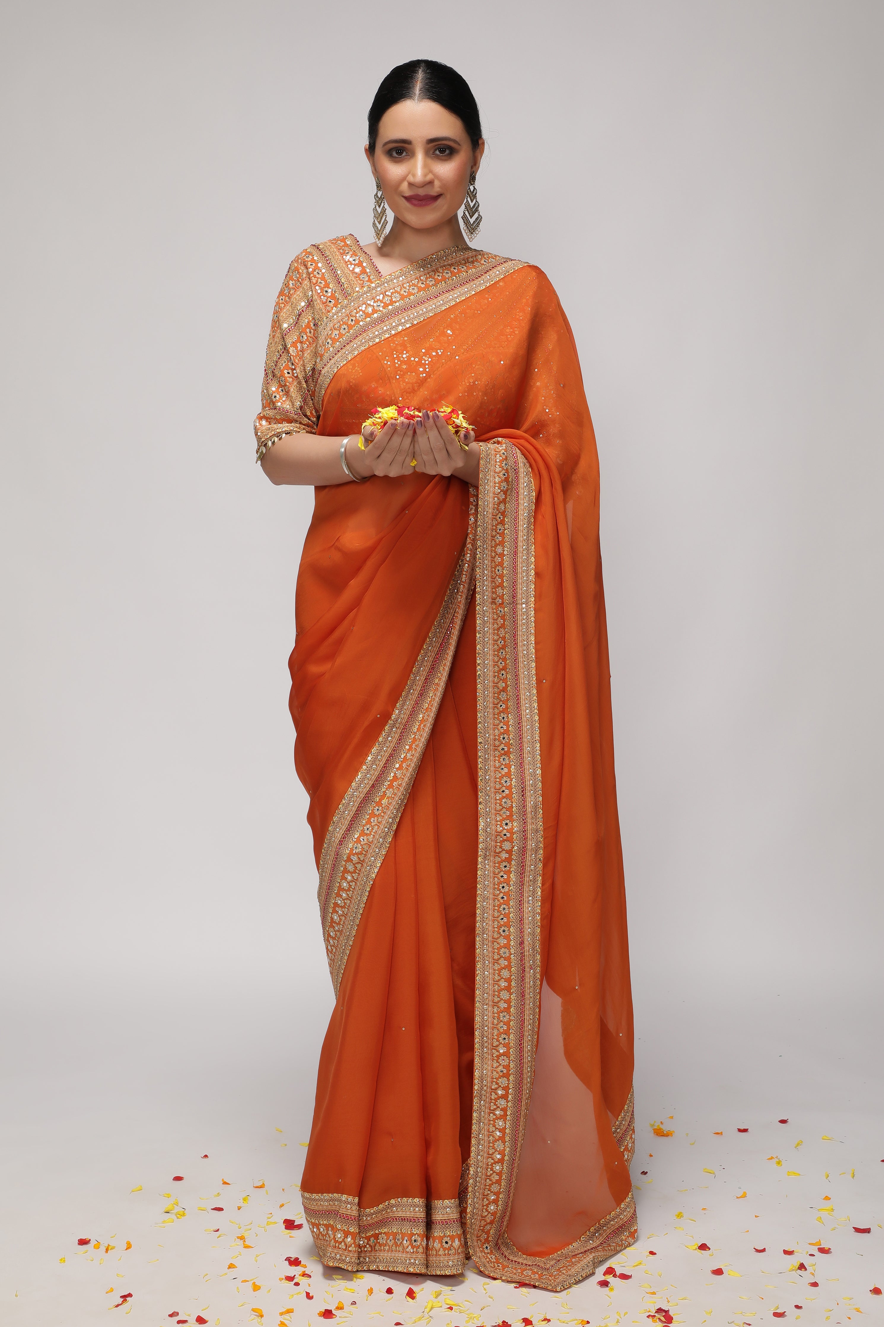 Orange Silk Organza Saree with Sequin Highlights & Mirror Work Border
