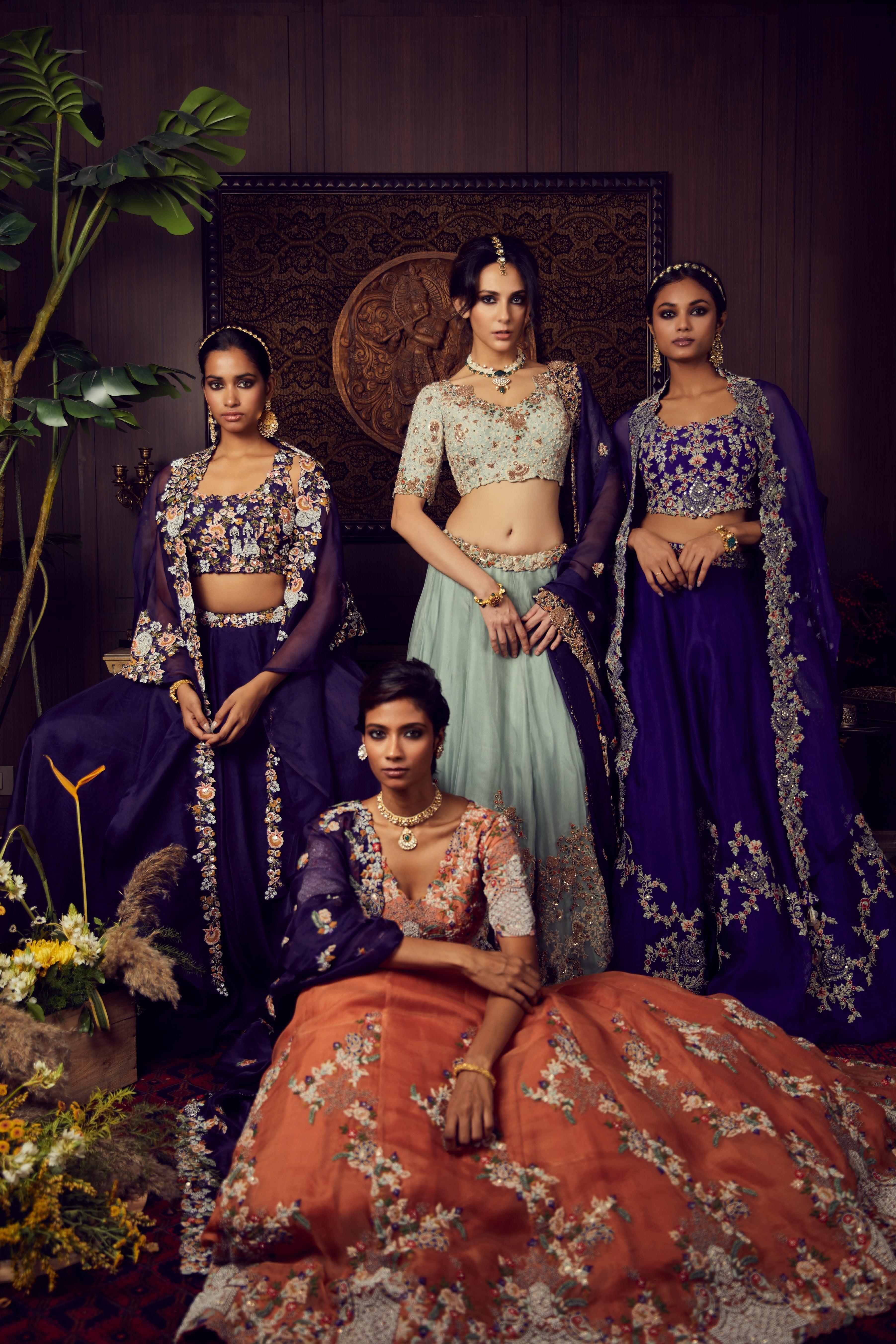 Aqua organza lehenga and silk blouse with contrast organza dupatta  Mokshaa
