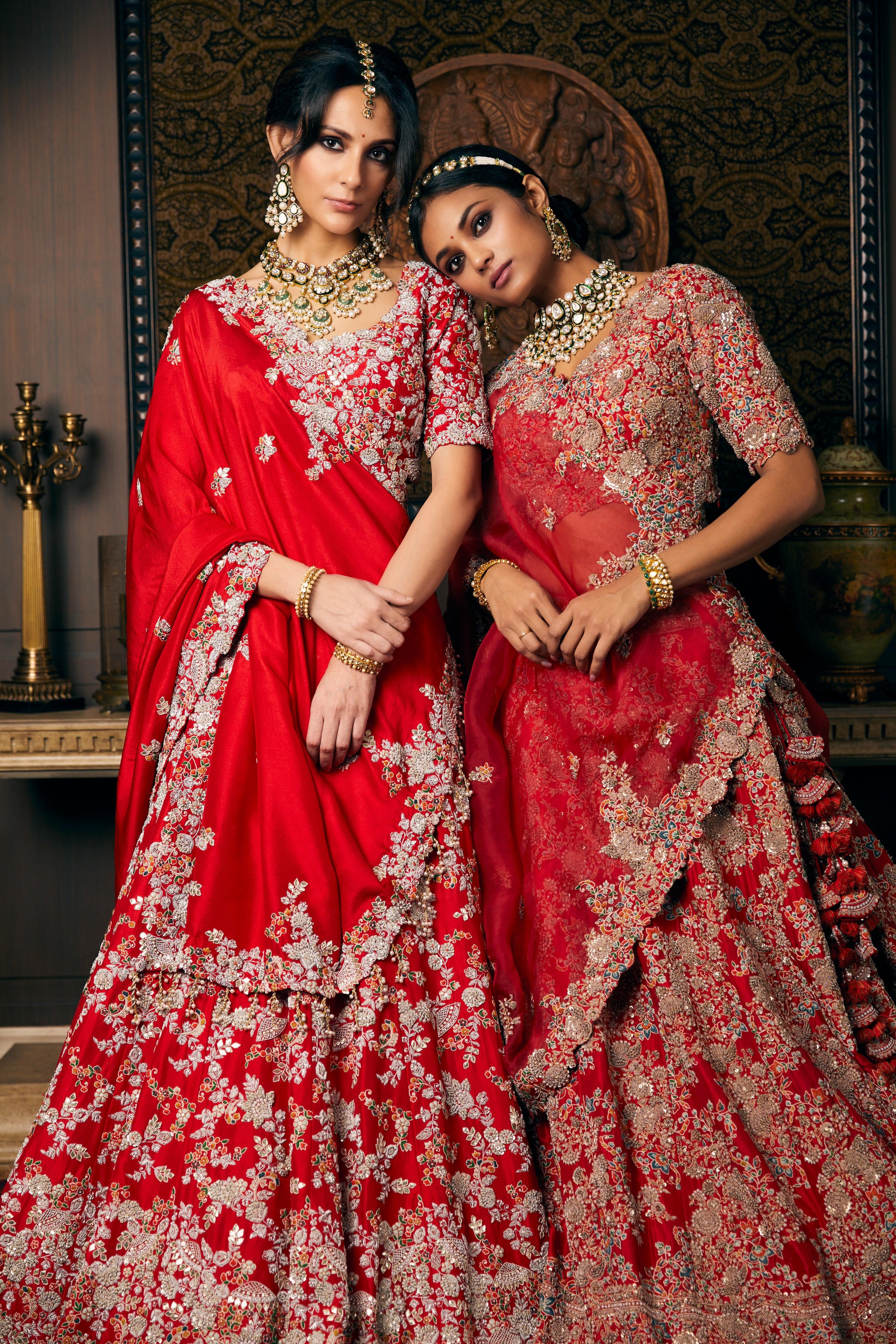 Blood red silk lehenga and blouse with organza dupatta and veil  Mokshaa