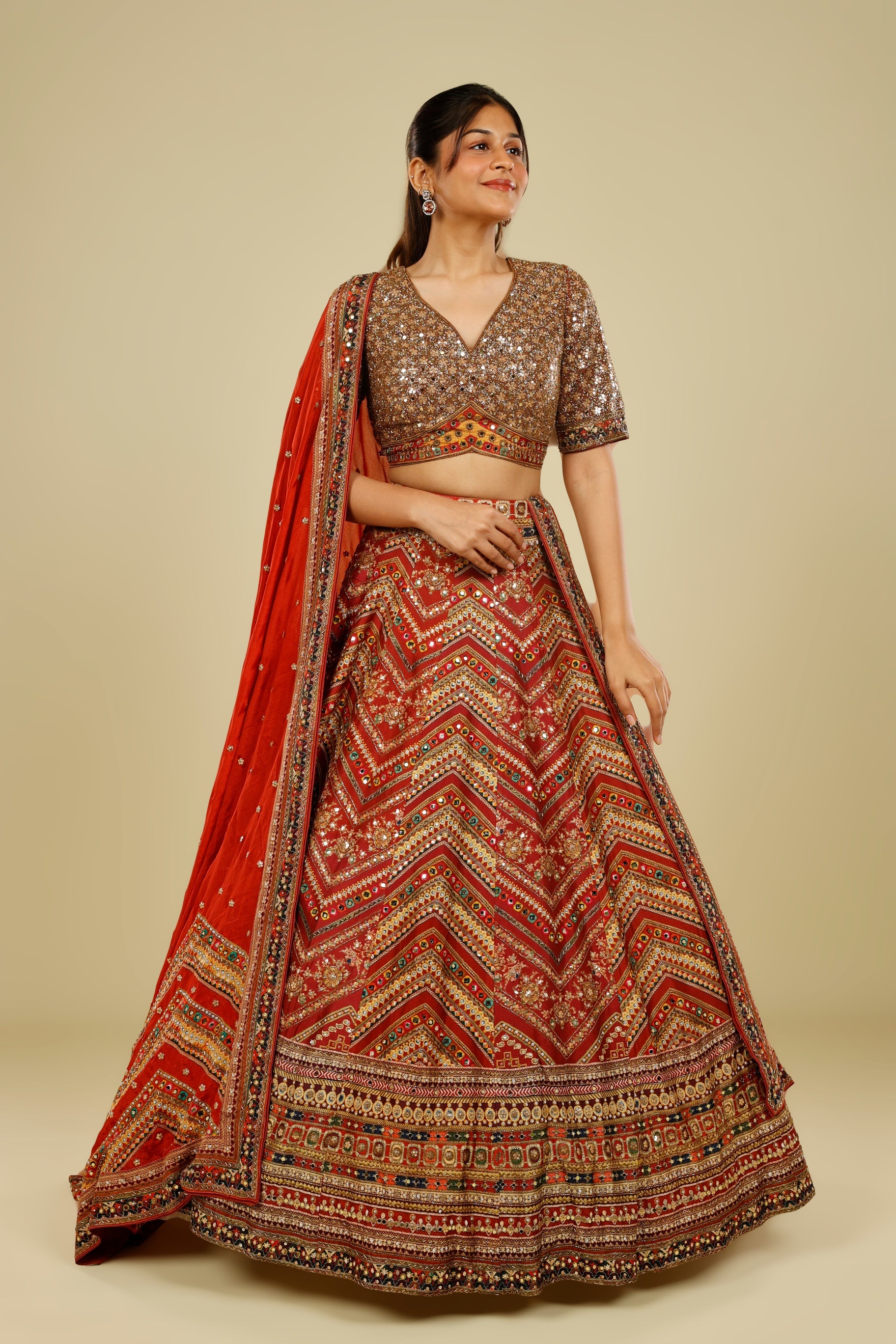 Rust Printed Silk Lehenga Set with Sequin & Kutdana Embroidery | Mokshaa