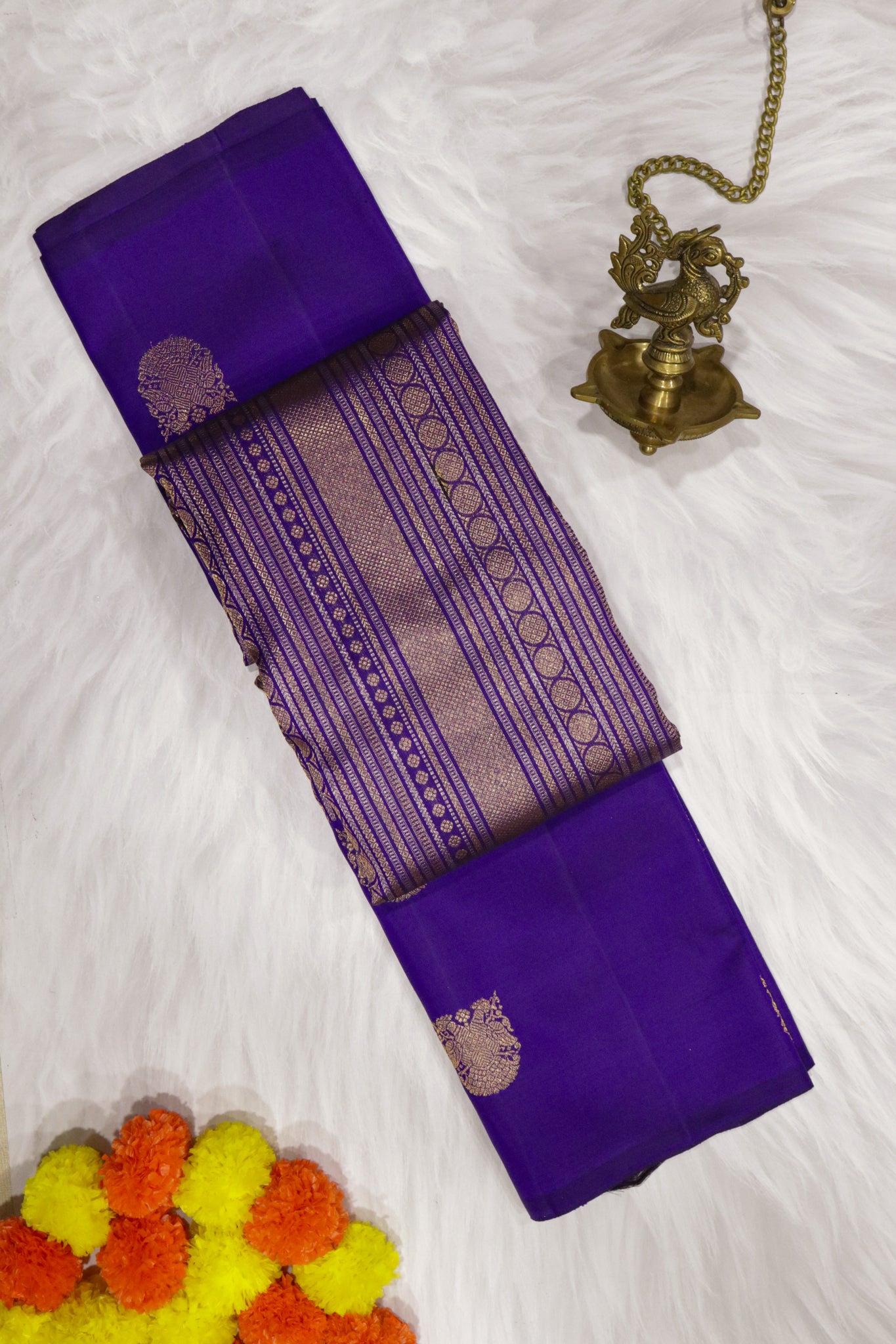 Blue Kanchipuram Silk Saree with Gold & Silver Geometrical Weaving and Zari Motif Border
