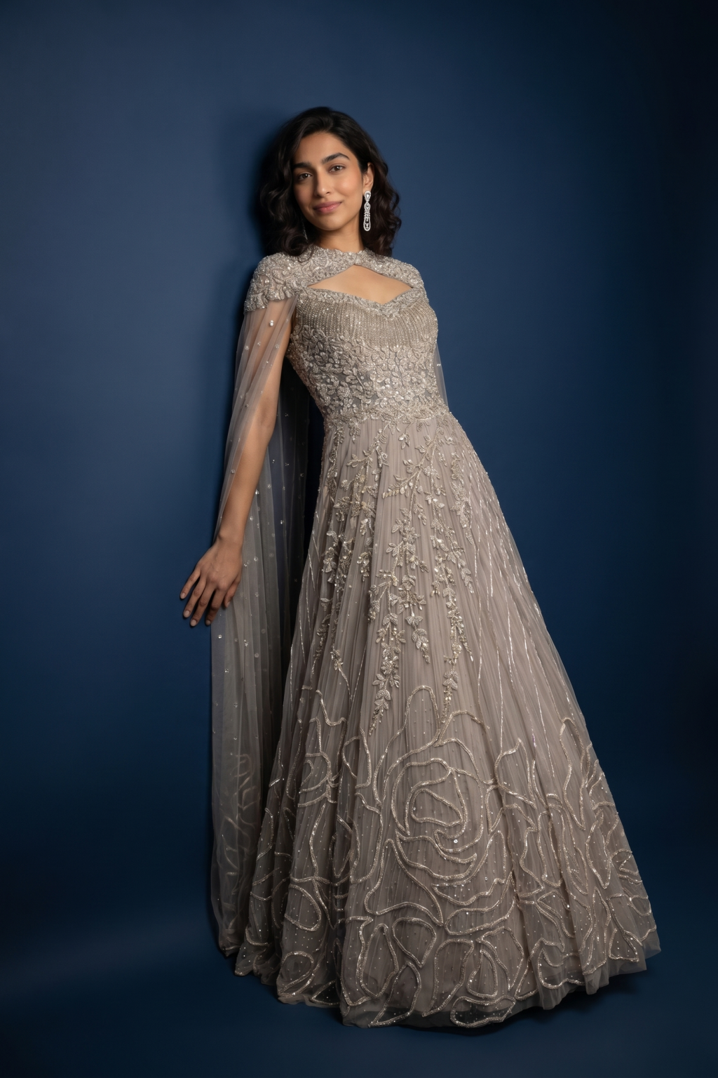 Champagne Gold Net Gown with Embellished Cape