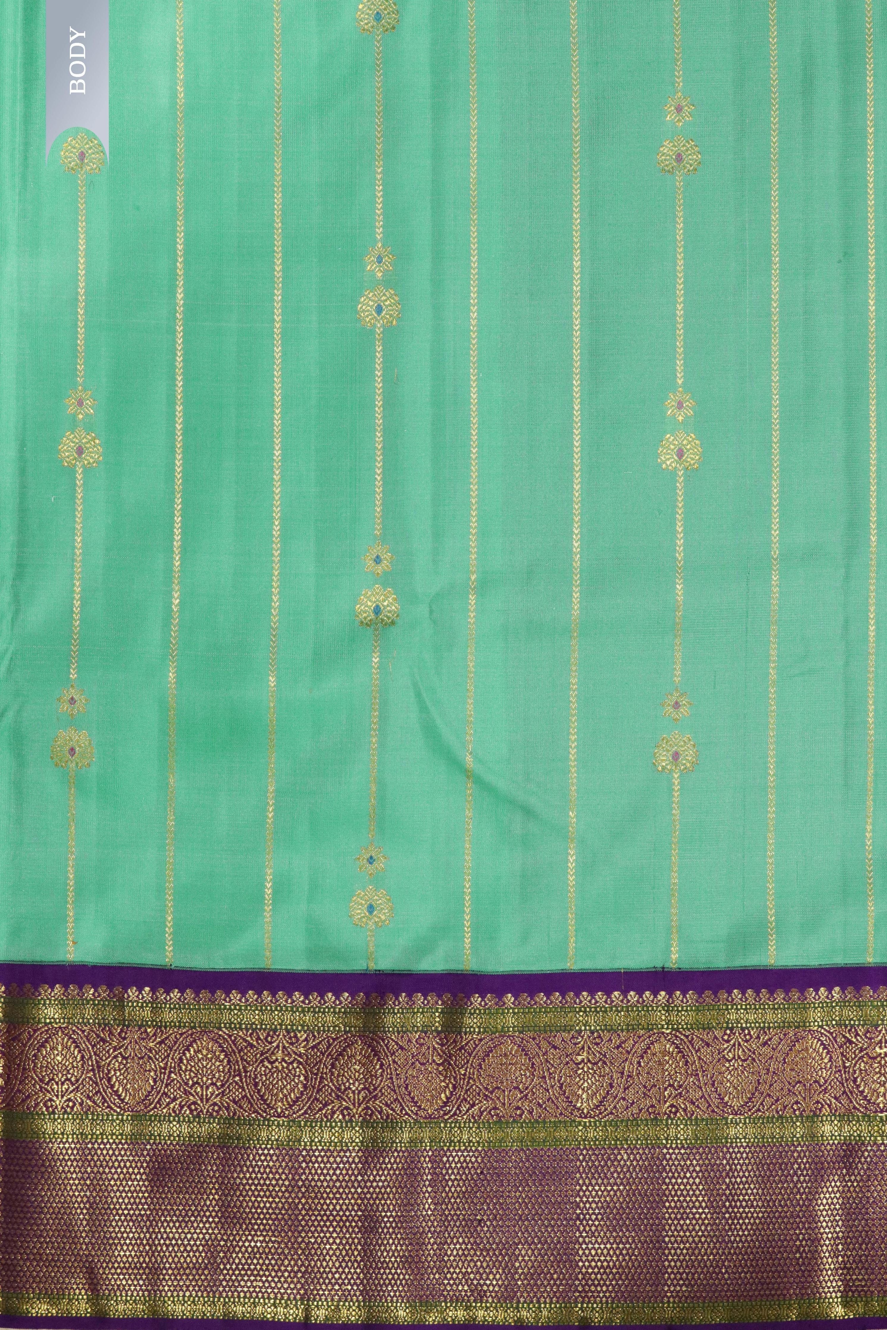 Turquoise Blue Kanchipuram Silk Saree with Zari Stripes, Buttas & Contrast Border - Mokshaa