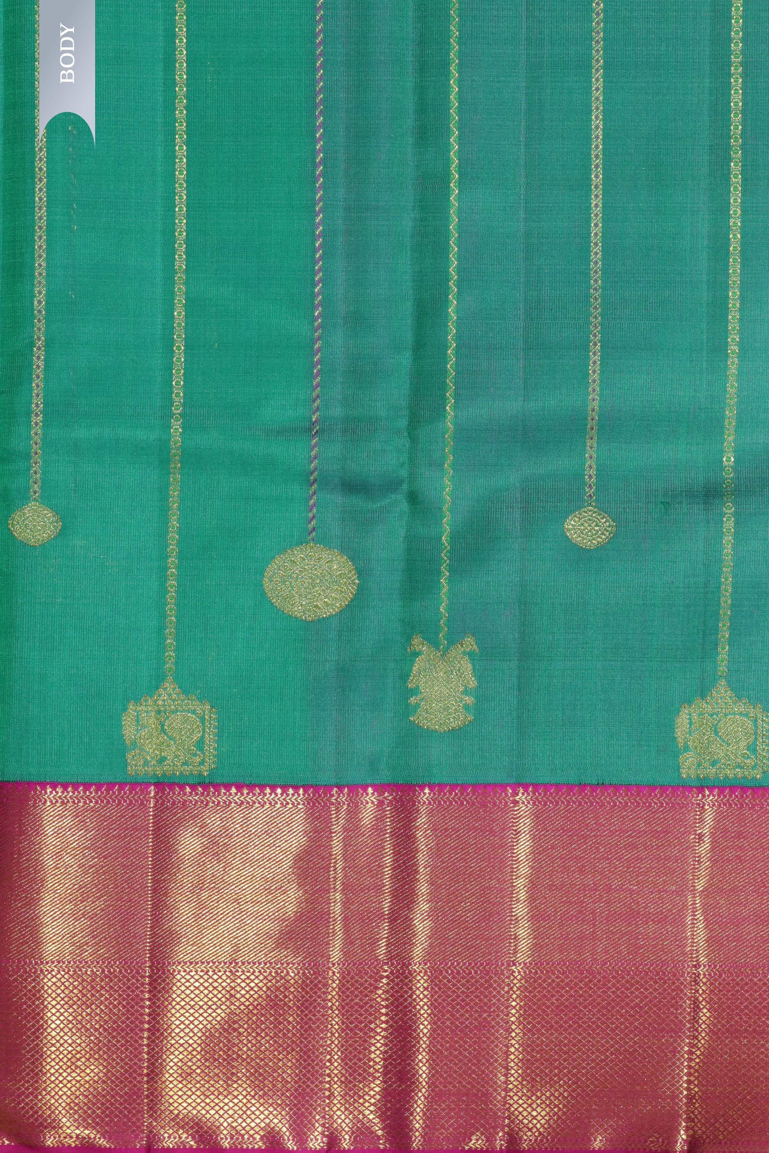 Turquoise Blue Kanchipuram Silk Saree with Zari Stripes, Buttas & Contrast Border - Mokshaa