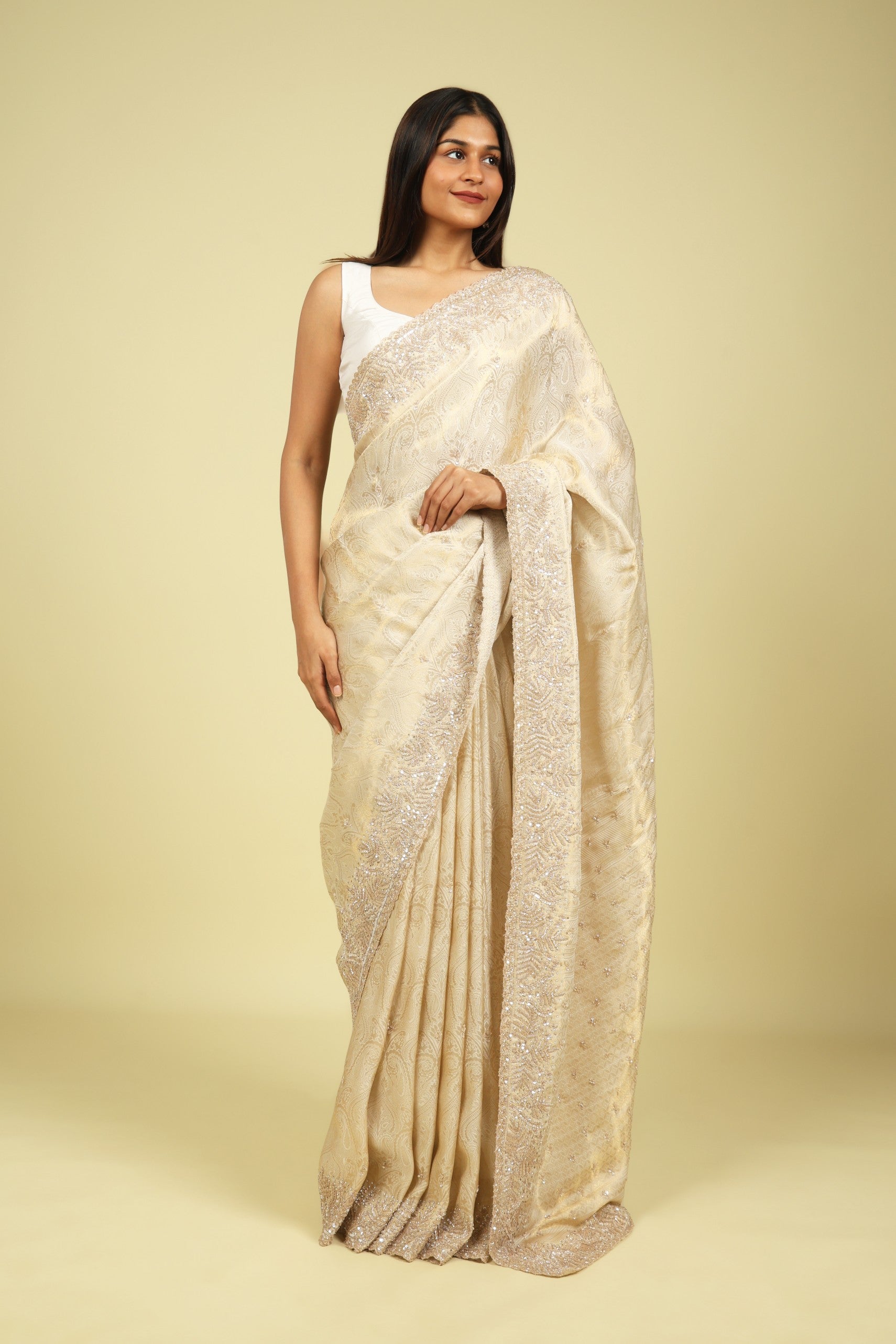 Off White Handloom Silk Saree with Banarasi Zari Weaving & Bead-Sequin Border