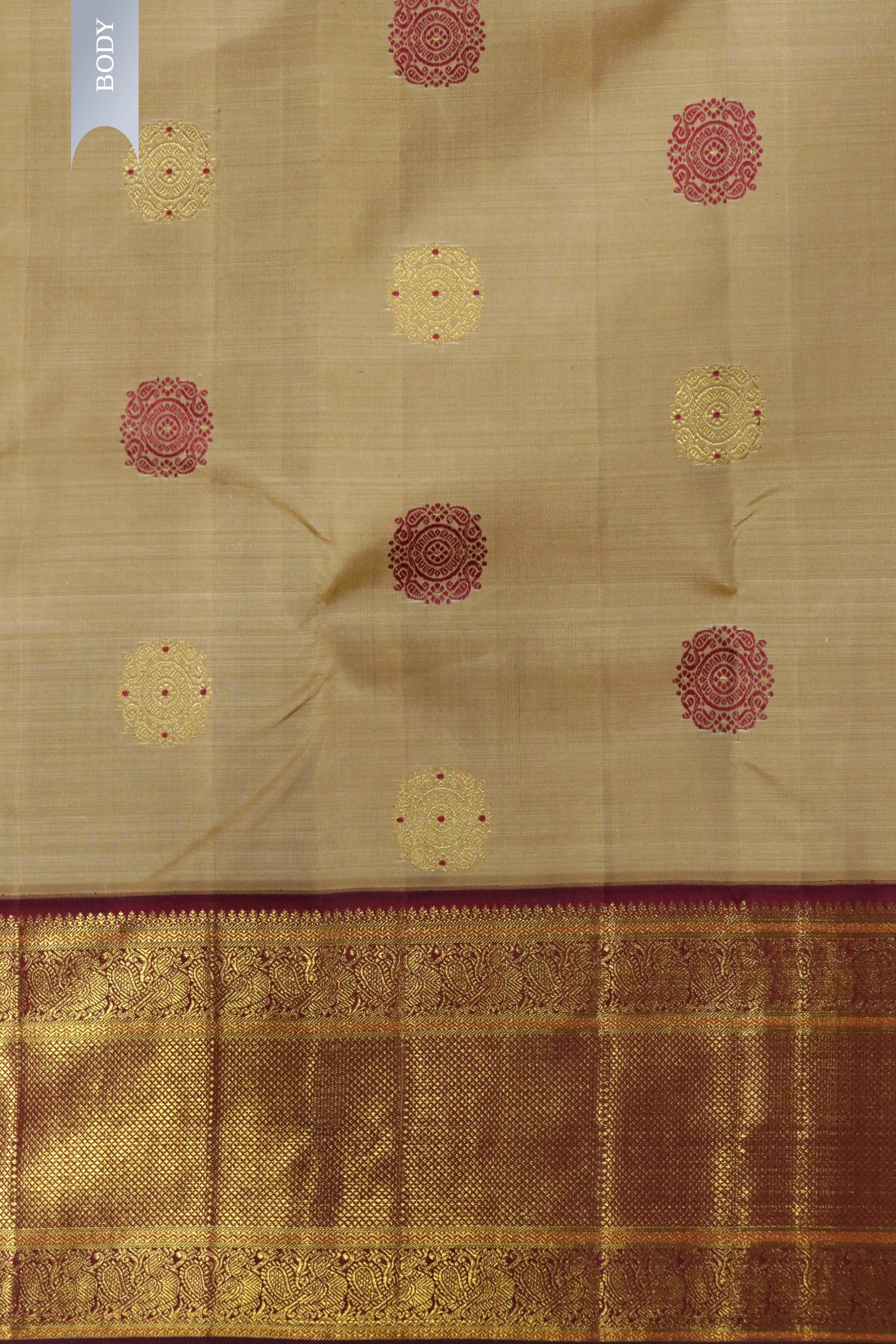 Beige Kanchipuram Silk Saree with Zari & Thread Motifs and Contrast Zari Border - Mokshaa