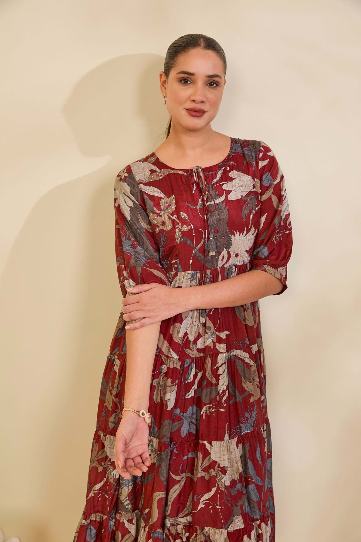 Maroon Printed Muslin Tiered Dress with Tassel Tie-Up Neckline