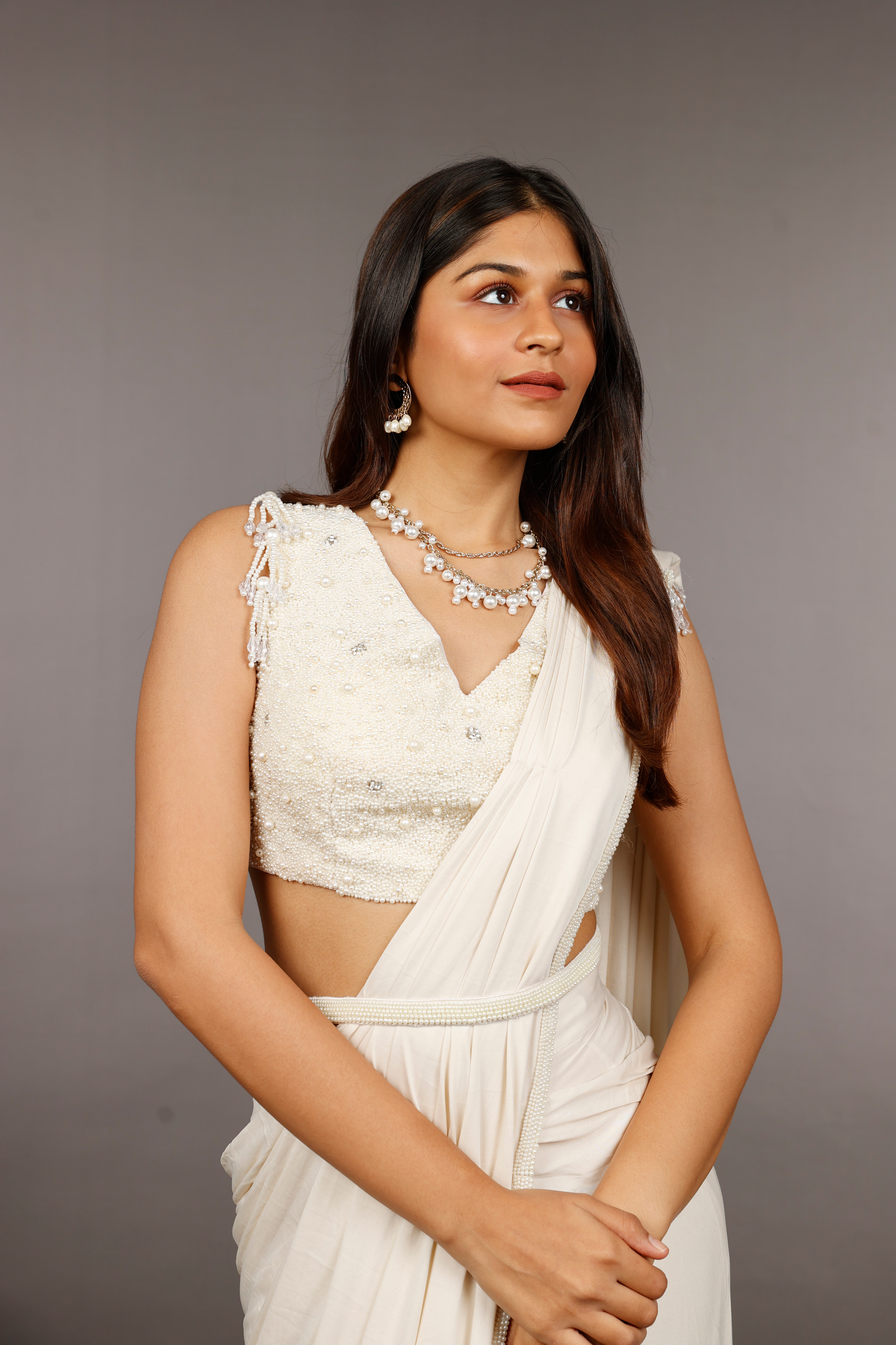 Ivory Lycra Drape Saree with Pearl & Stone Embroidered Blouse