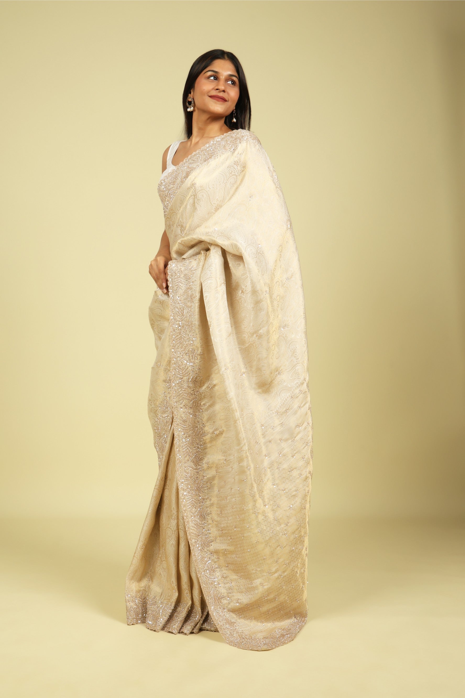 Off White Handloom Silk Saree with Banarasi Zari Weaving & Bead-Sequin Border