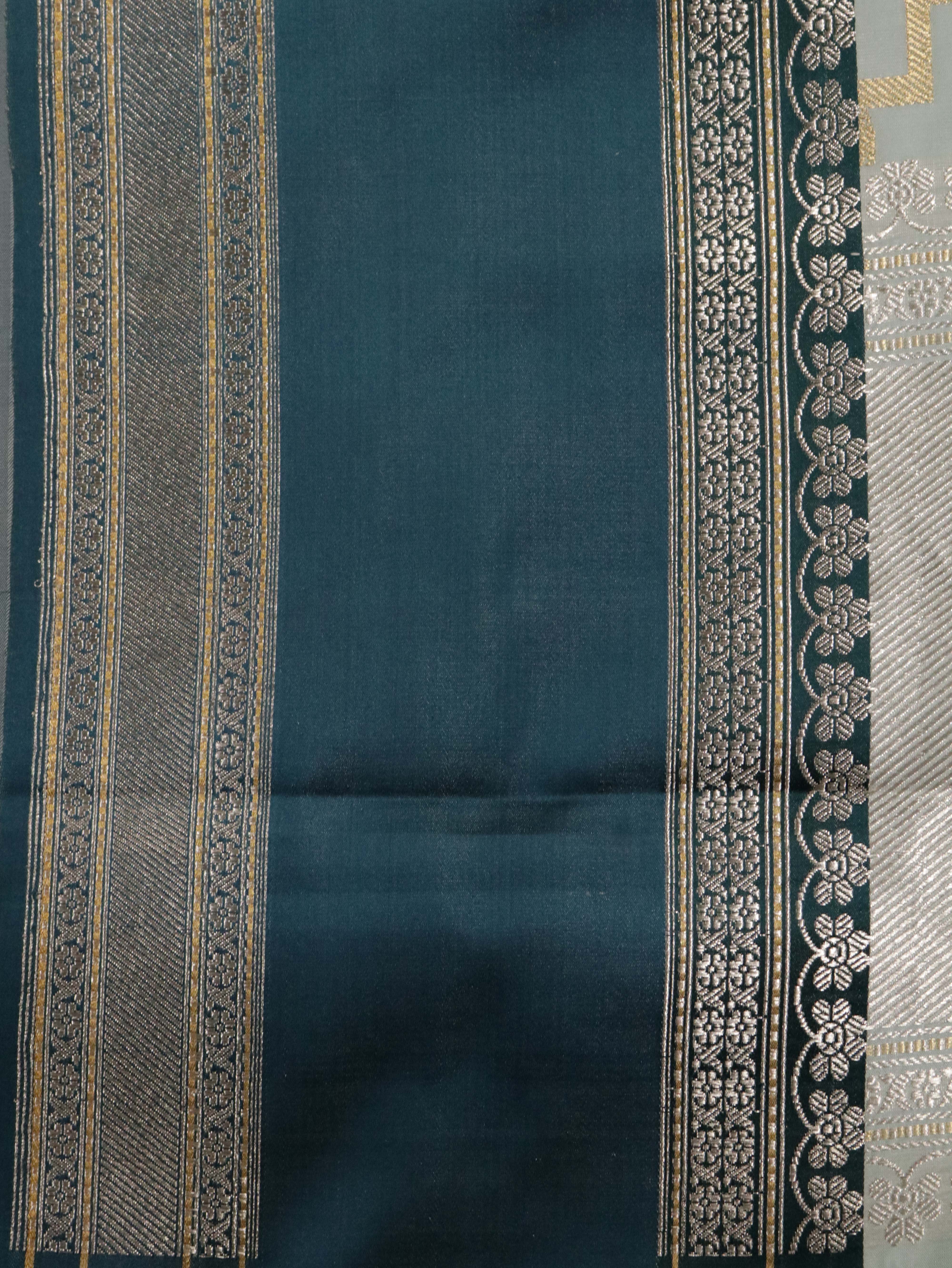 Light Blue Banarasi Silk Saree with Silver–Gold Zig-Zag Weave & Contrast Satin Border