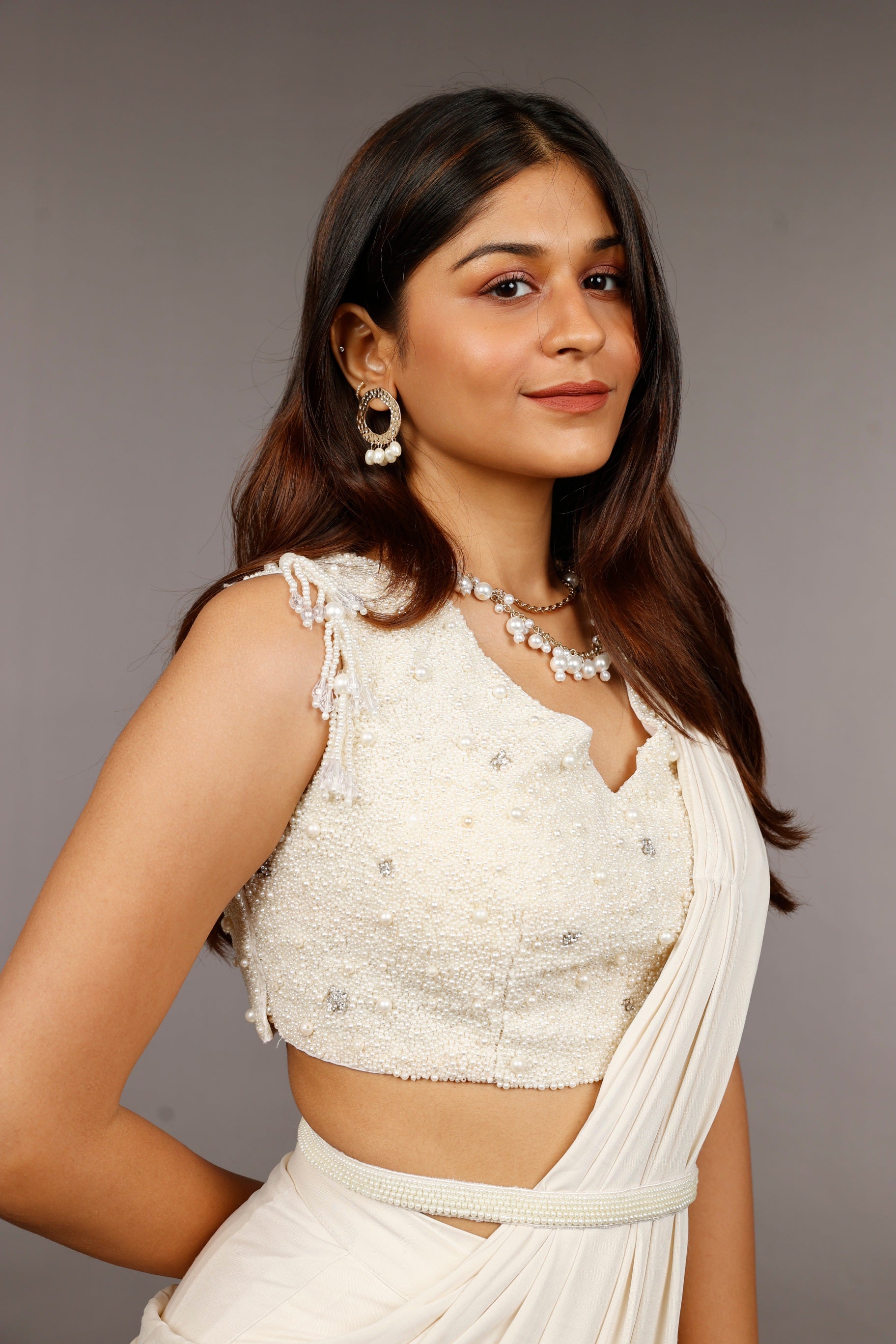 Ivory Lycra Drape Saree with Pearl & Stone Embroidered Blouse