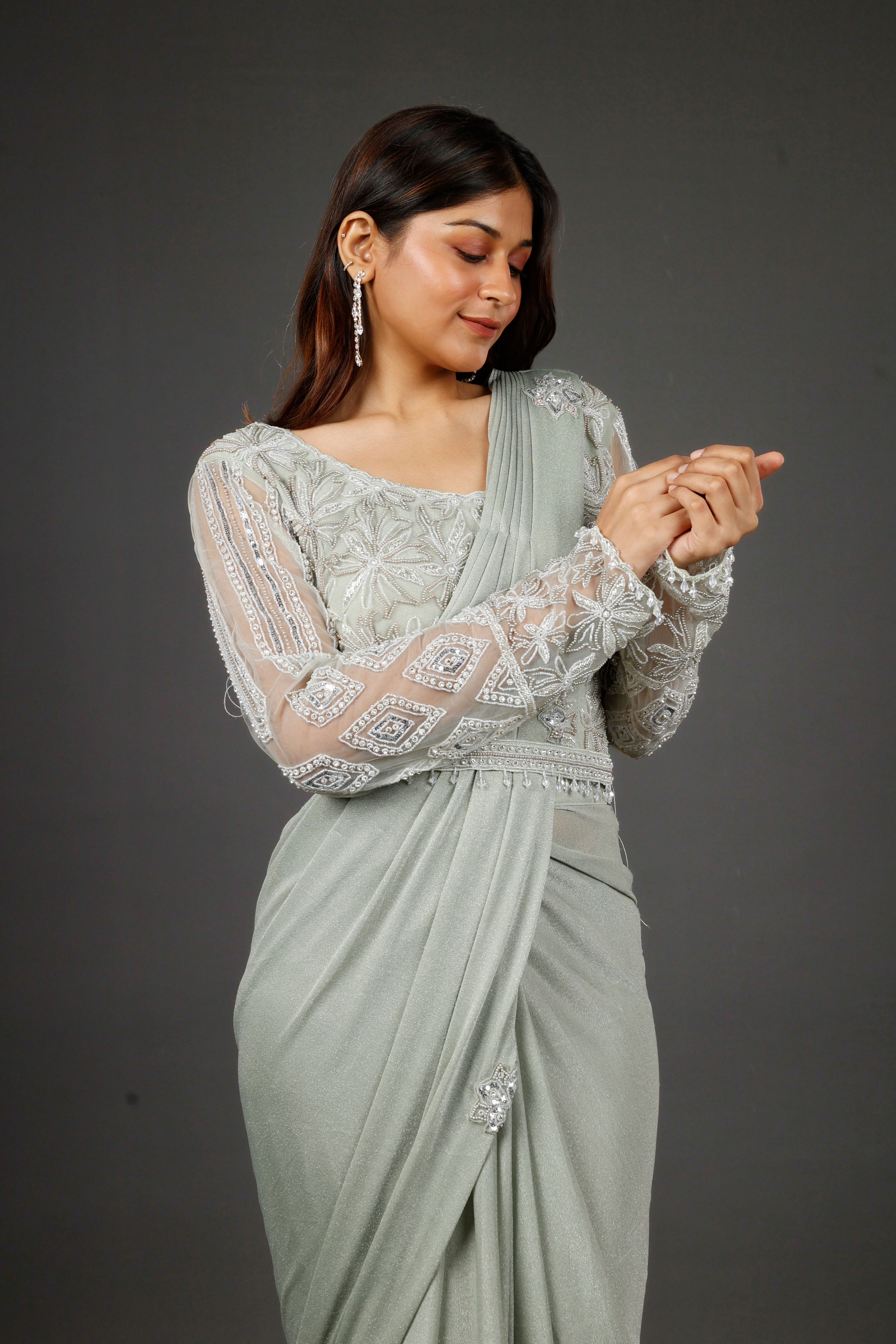 Sage Green Shimmer Drape Saree with Kutdana & Pearl Embroidery