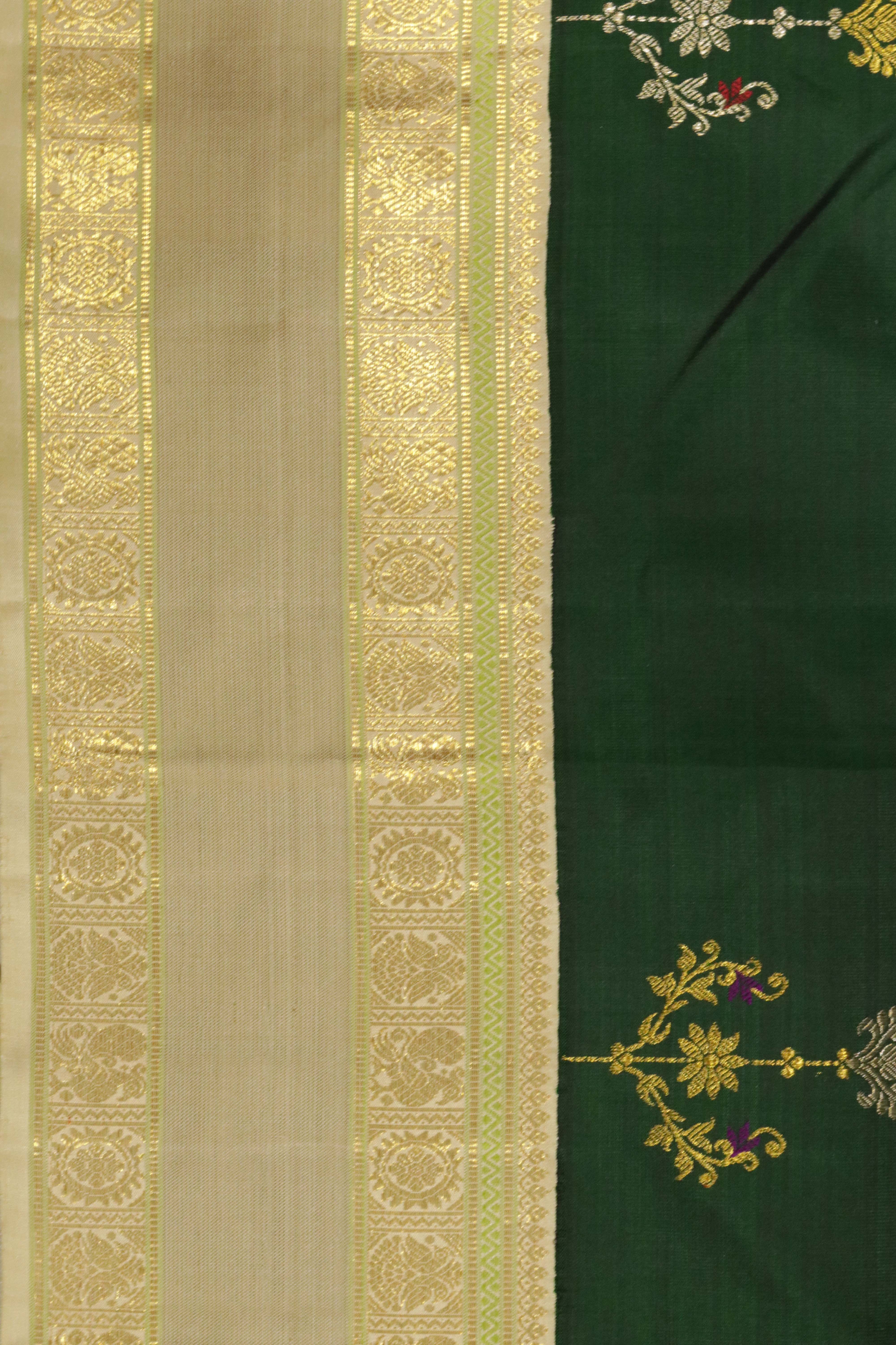 Bottle Green Kanchipuram Silk Saree with Silver & Gold Zari Thread Motifs and Contrast Border
