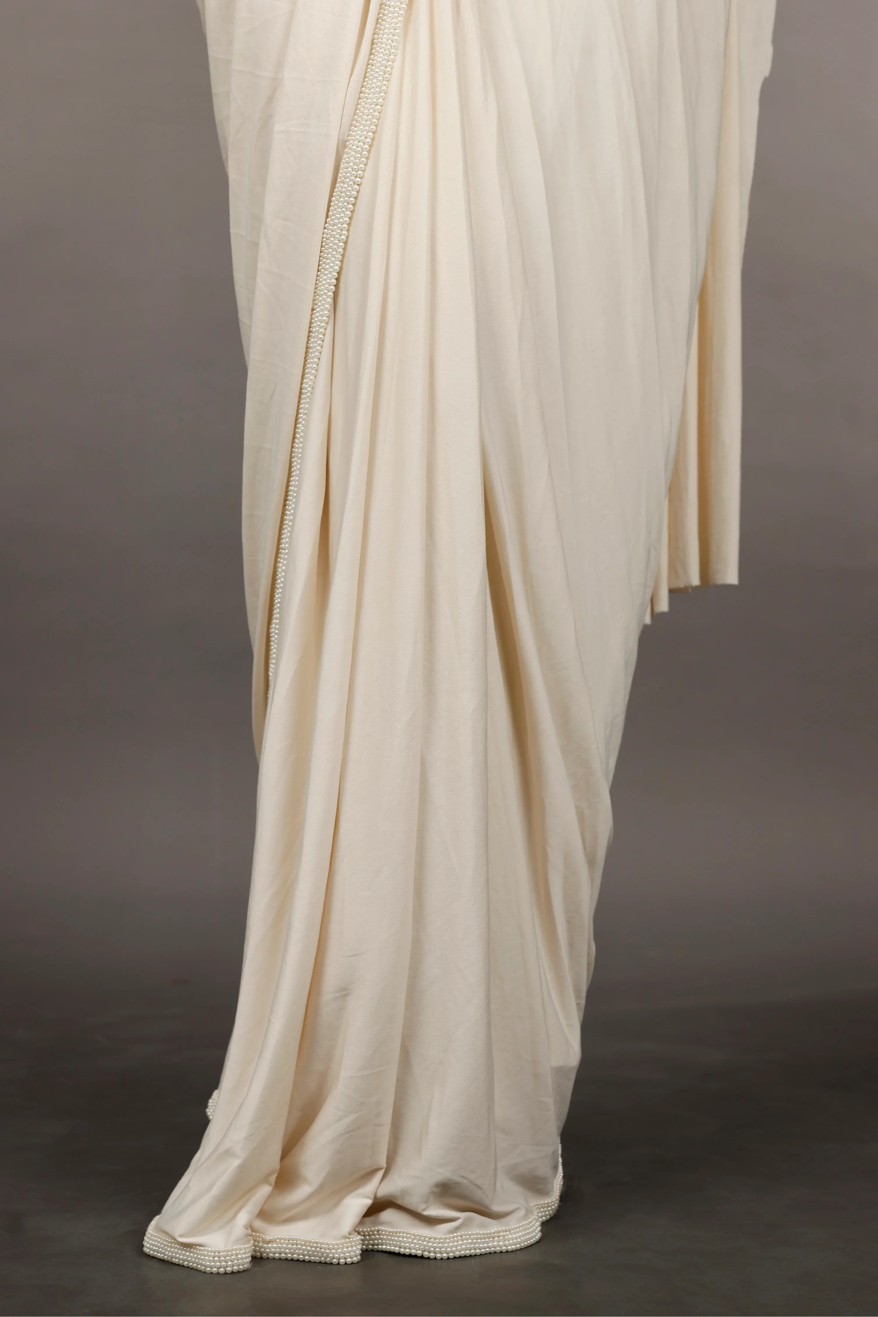 Ivory Lycra Drape Saree with Pearl & Stone Embroidered Blouse - Mokshaa
