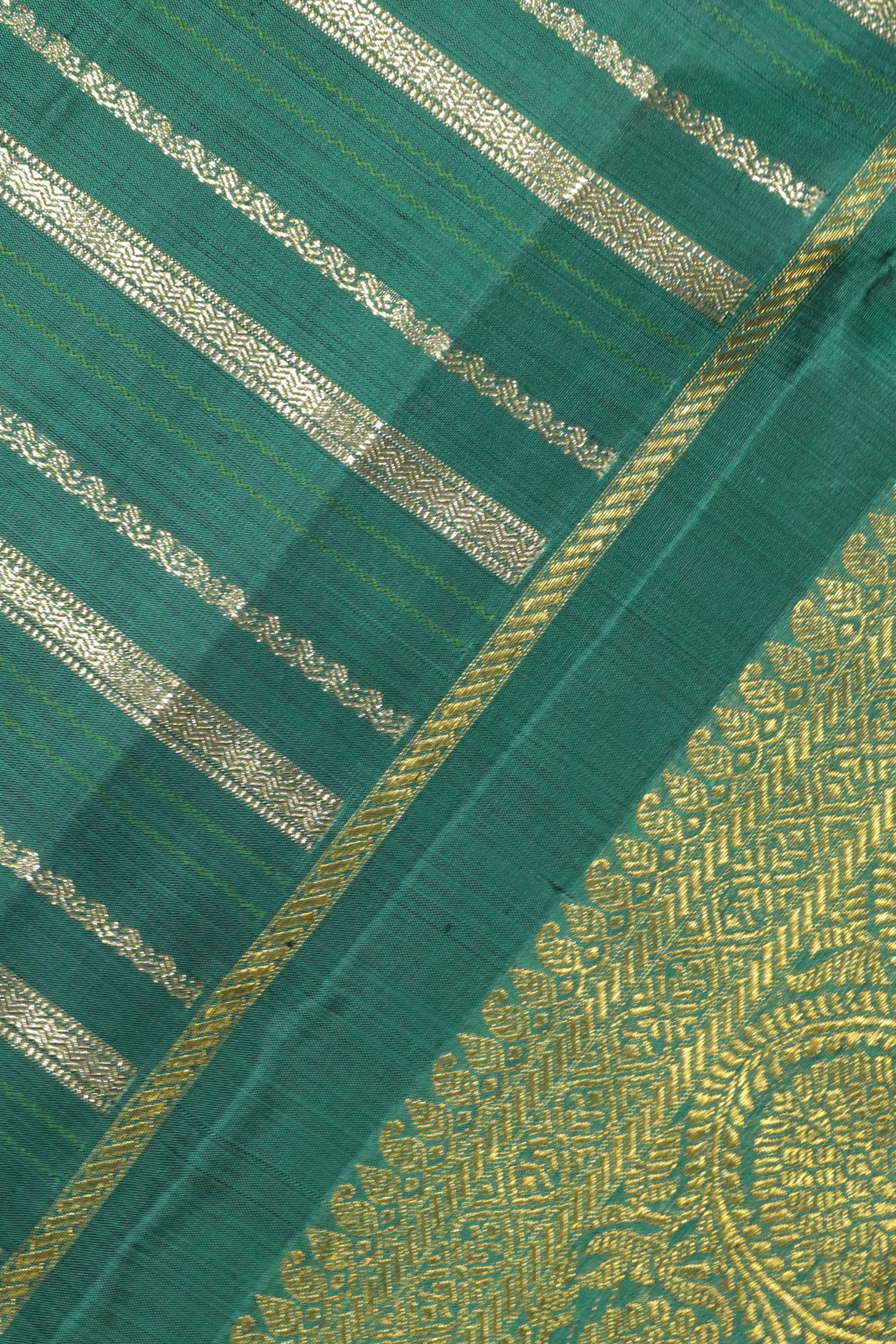 Teal Blue Kanchipuram Silk Saree with Silver Zari Stripes and Zari Border