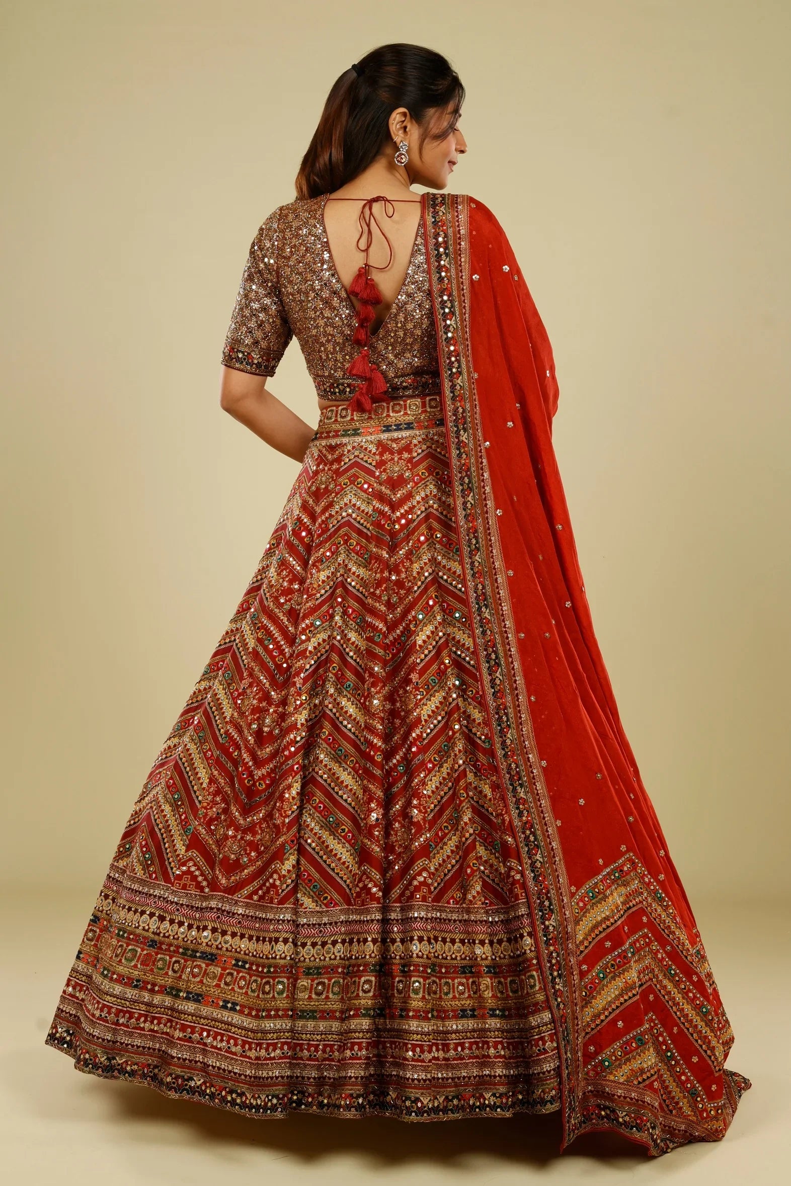 Rust Printed Silk Lehenga Set with Sequin & Kutdana Embroidery | Mokshaa