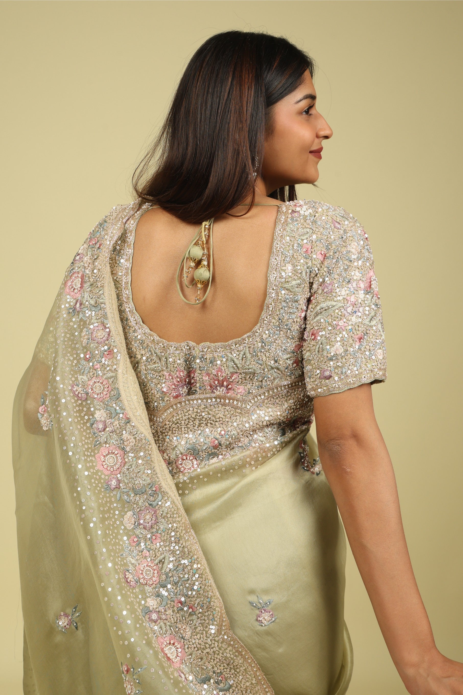 Light Green Organza Saree with Sequin & Thread Embroidery Motifs